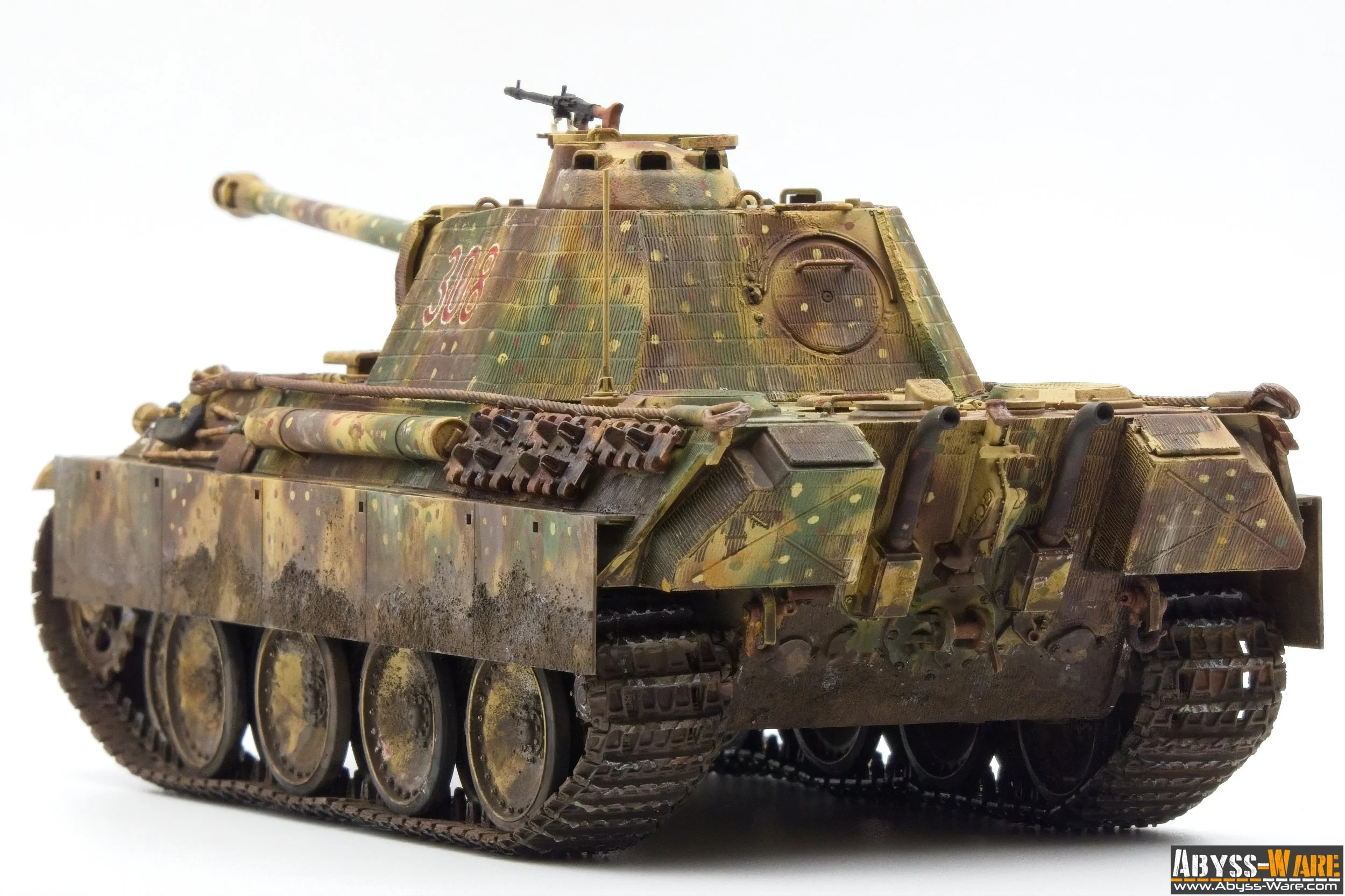 Model of a military tank with camouflage colors on a white background.