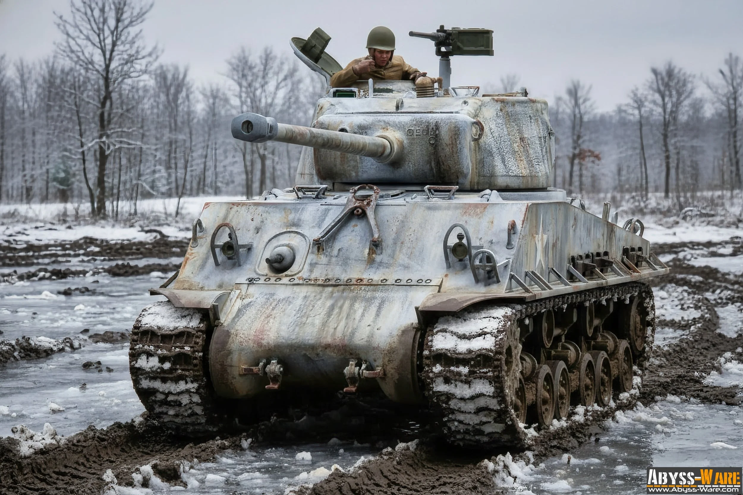 A soldier in a beige uniform and helmet riding on a weathered, rusty military tank across a snowy, muddy field with leafless trees in the background.