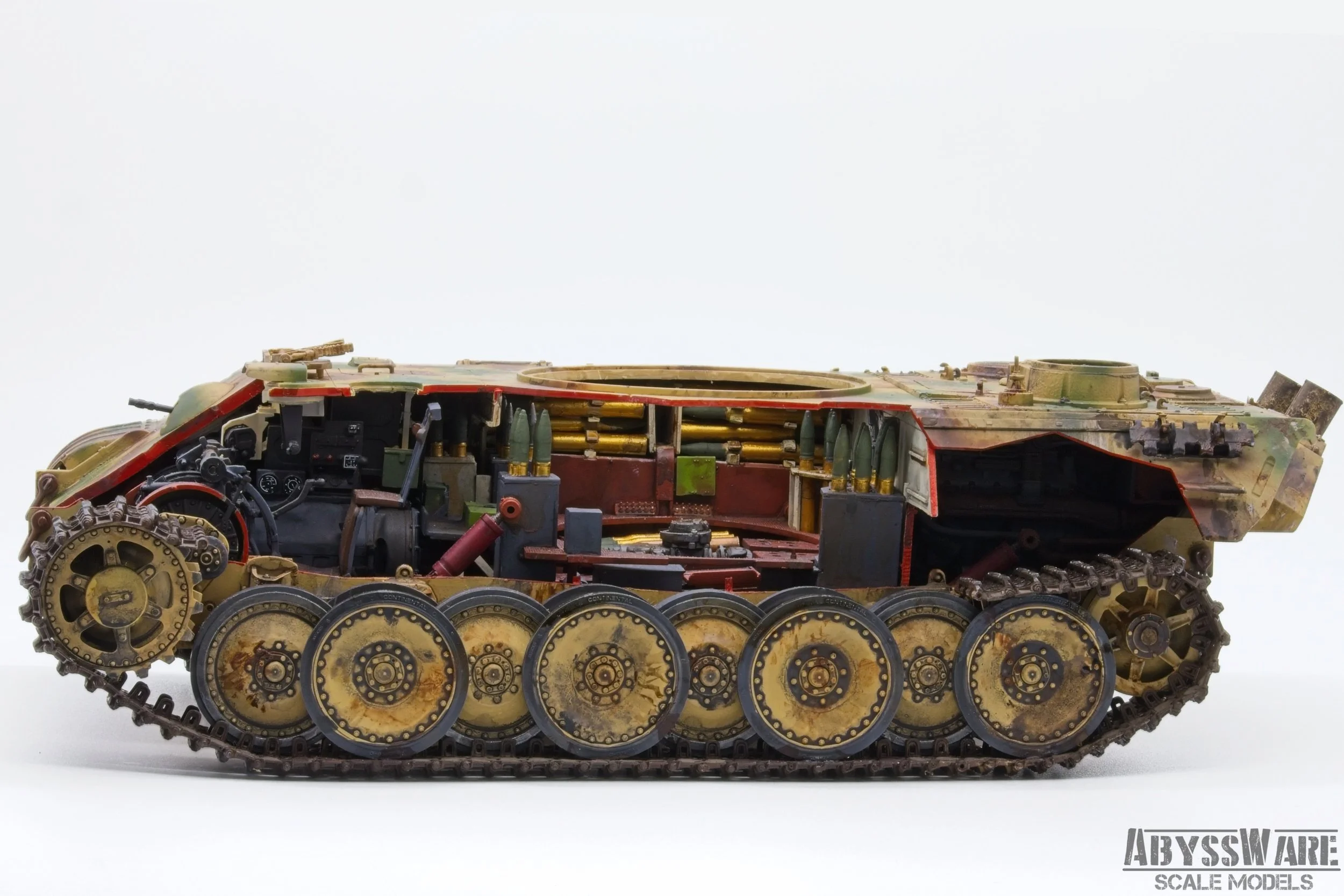 A detailed scale model of a military tank with visible internal components and tracks, labeled 'ABYSSWARE SCALE MODELS' in the bottom right corner.