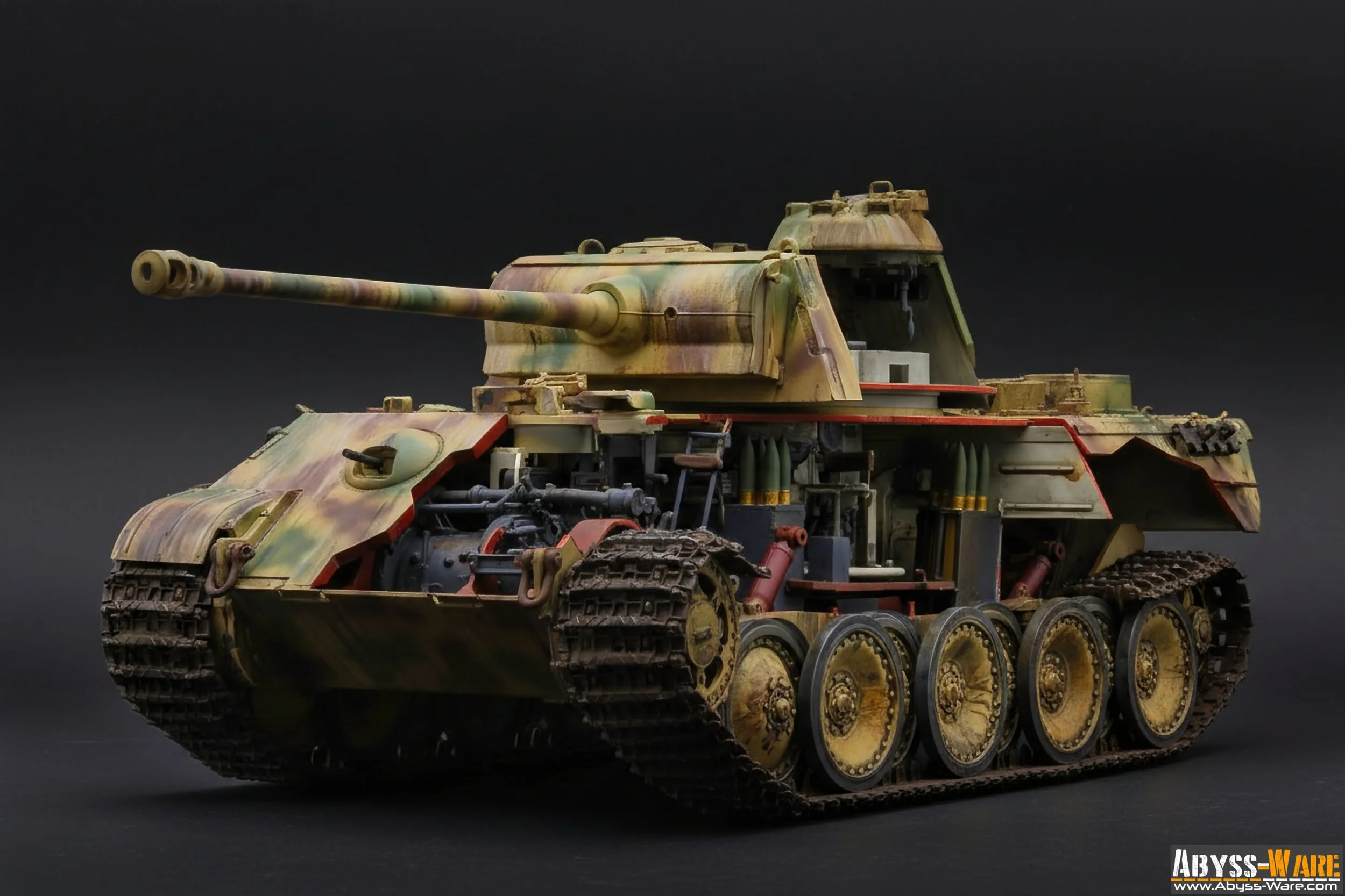 A detailed model of a military tank with camouflage paint, featuring a long barrel, tracks, and exposed mechanical parts against a dark background.