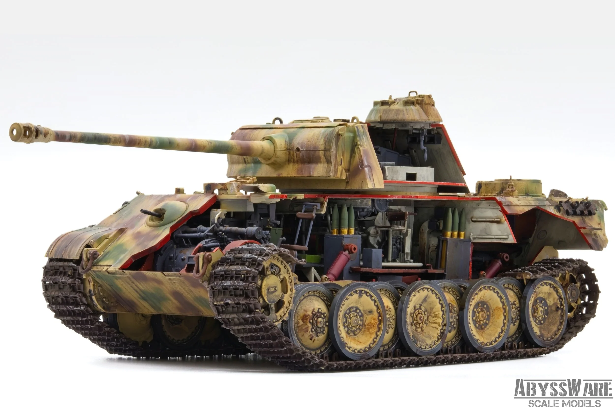 A detailed scale model of a military tank with camouflage paint, visible internal components, and tracks, displayed against a plain white background.