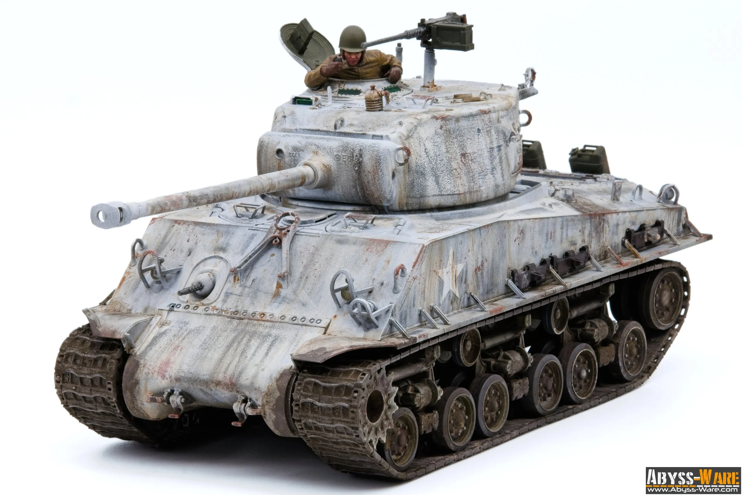 Model of a weathered military tank with a soldier figure in the turret, set against a plain white background.