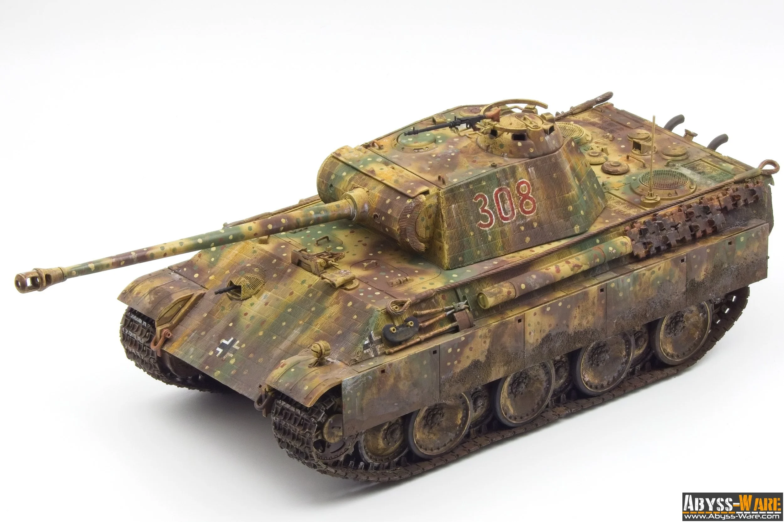 Model of a military tank with camouflage paint, the number 308 on the turret, and a long barrel.