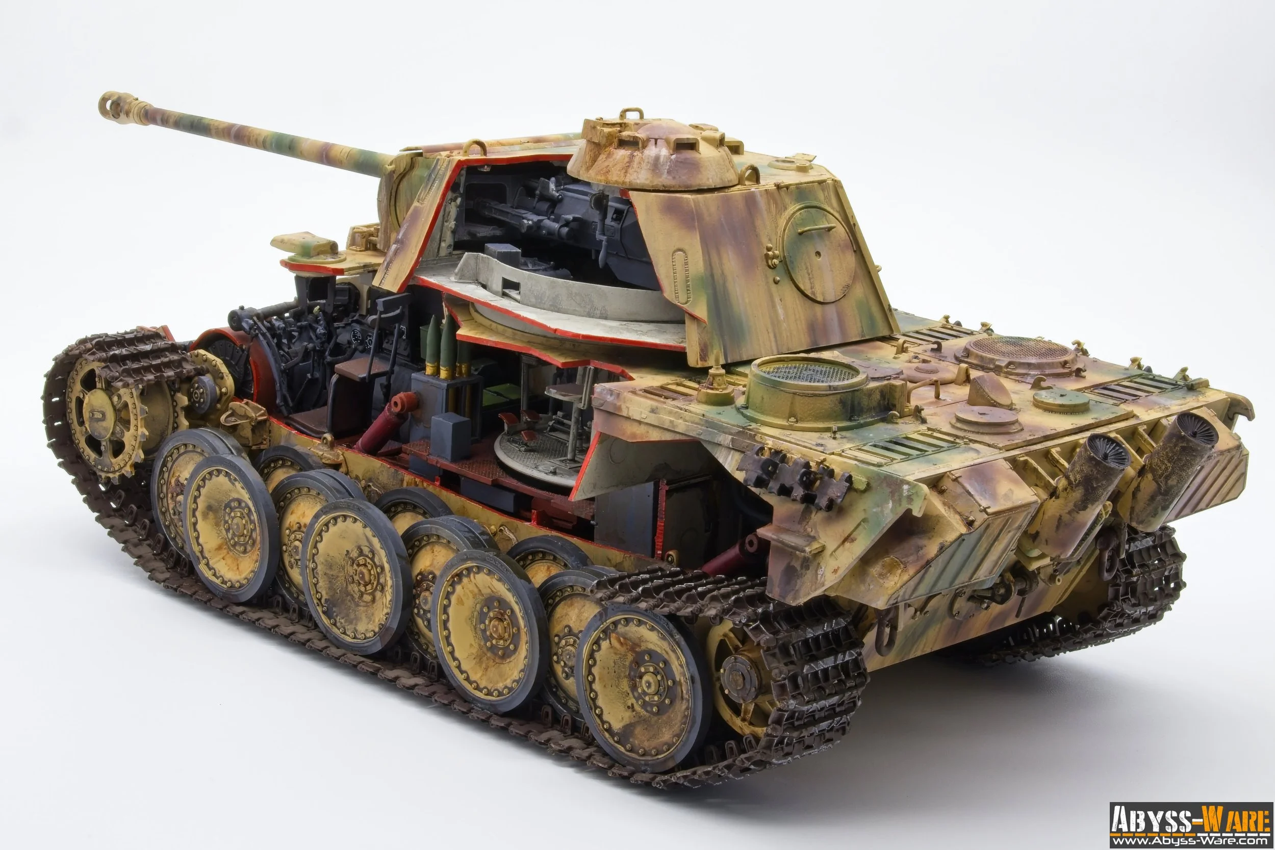 A detailed model of a military tank with ejection marks, showing internal components and weathered surface, placed against a plain white background.