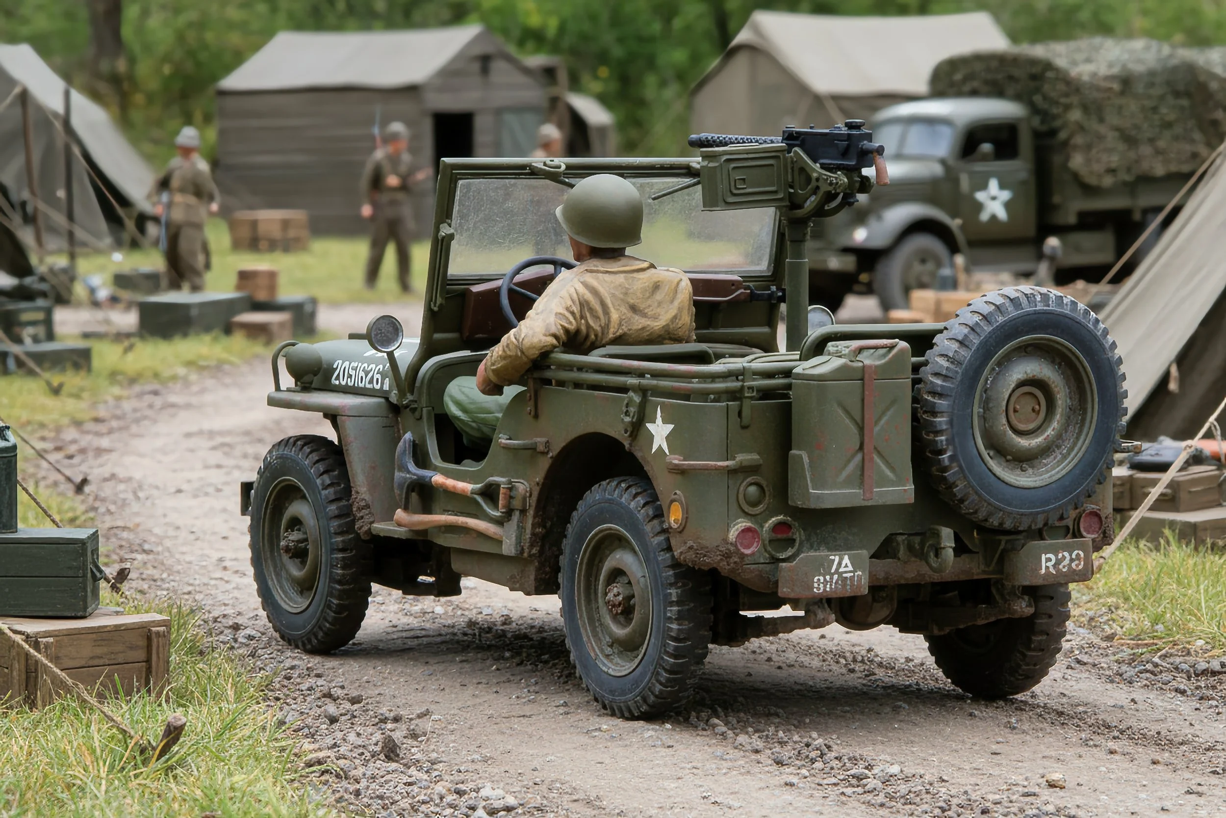 A military scene with a vintage jeep in the foreground and soldiers in the background, set in a wooded area with tents and military supplies.