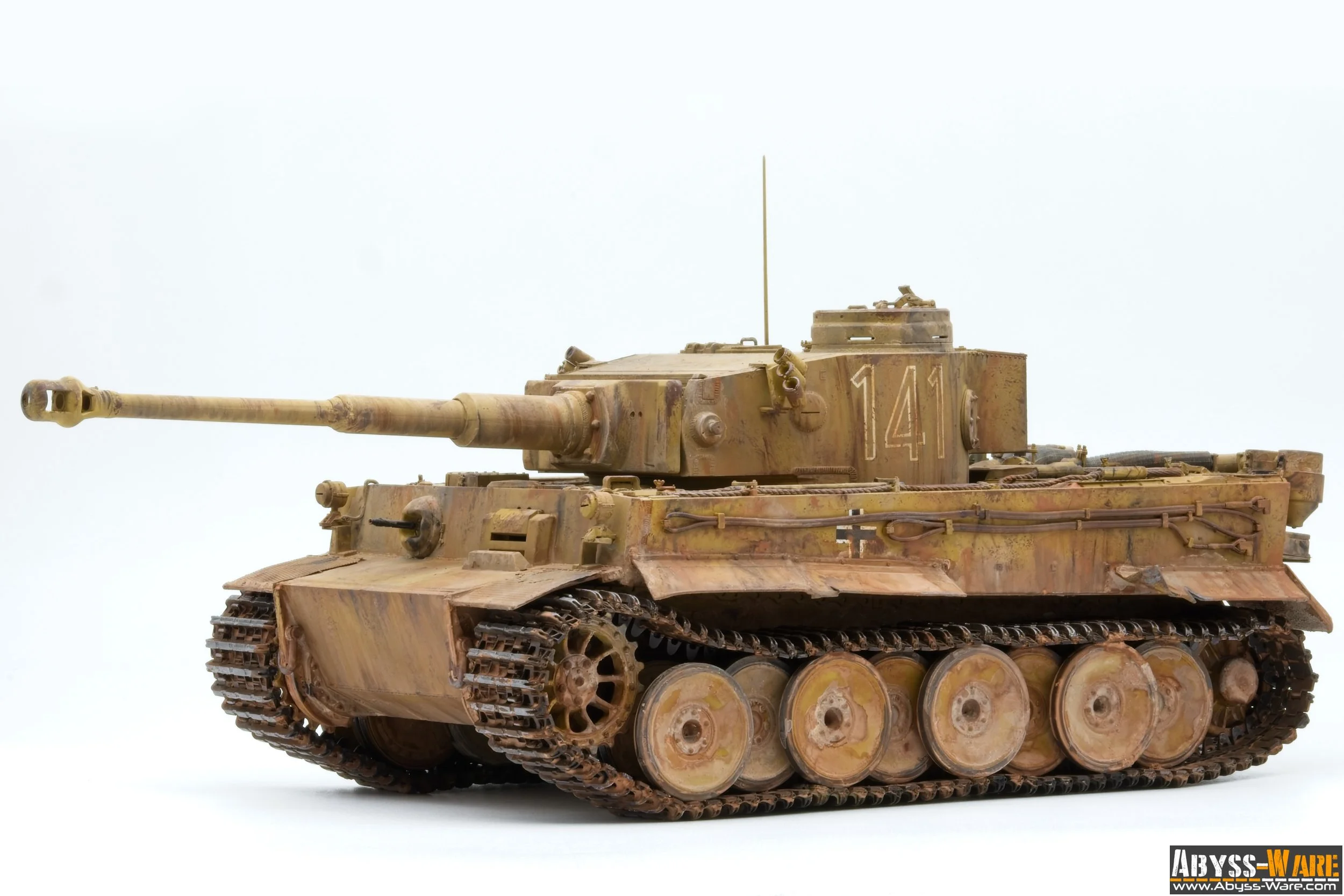 Model of a weathered German World War II tank with a beige camouflage pattern, marked with the number 141, on a plain white background.