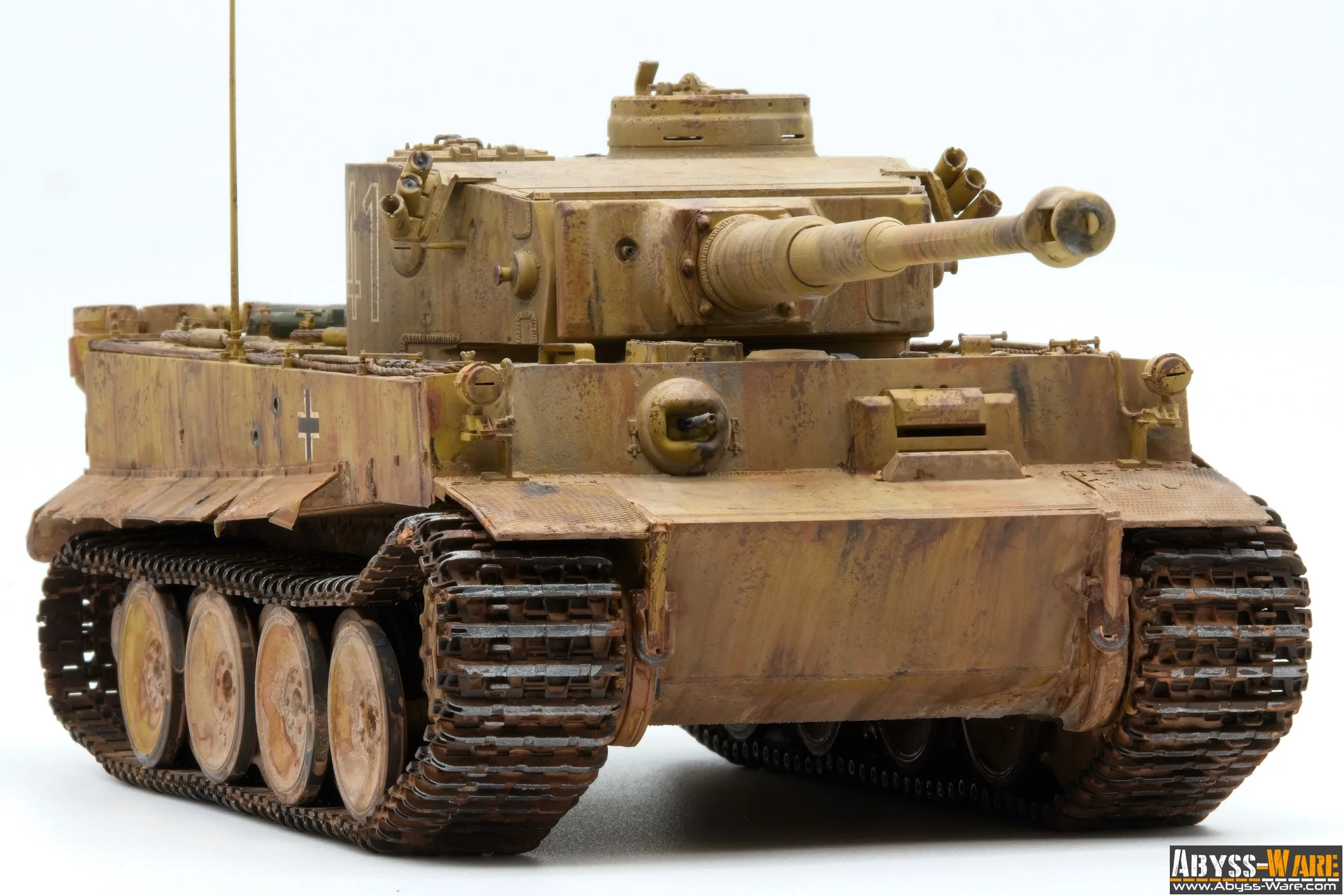 Model of a weathered military tank with a long barrel, tracks, and camouflage paint, placed on a white background.