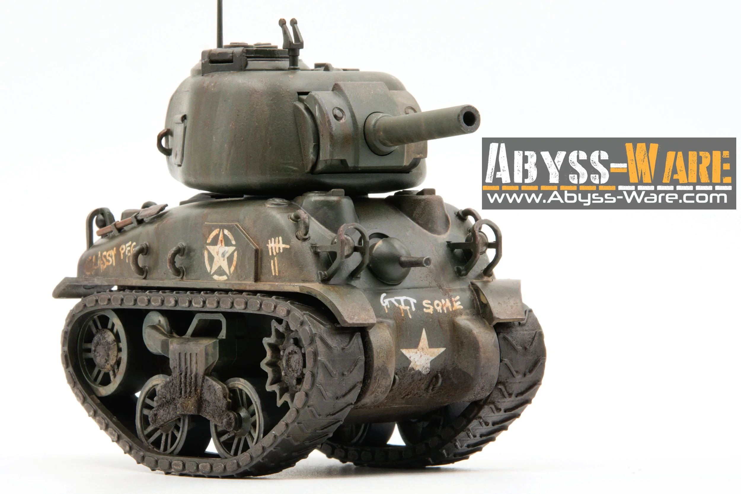 Model of a military tank with a black and green painted exterior, markings, and track wheels, shown against a white background.