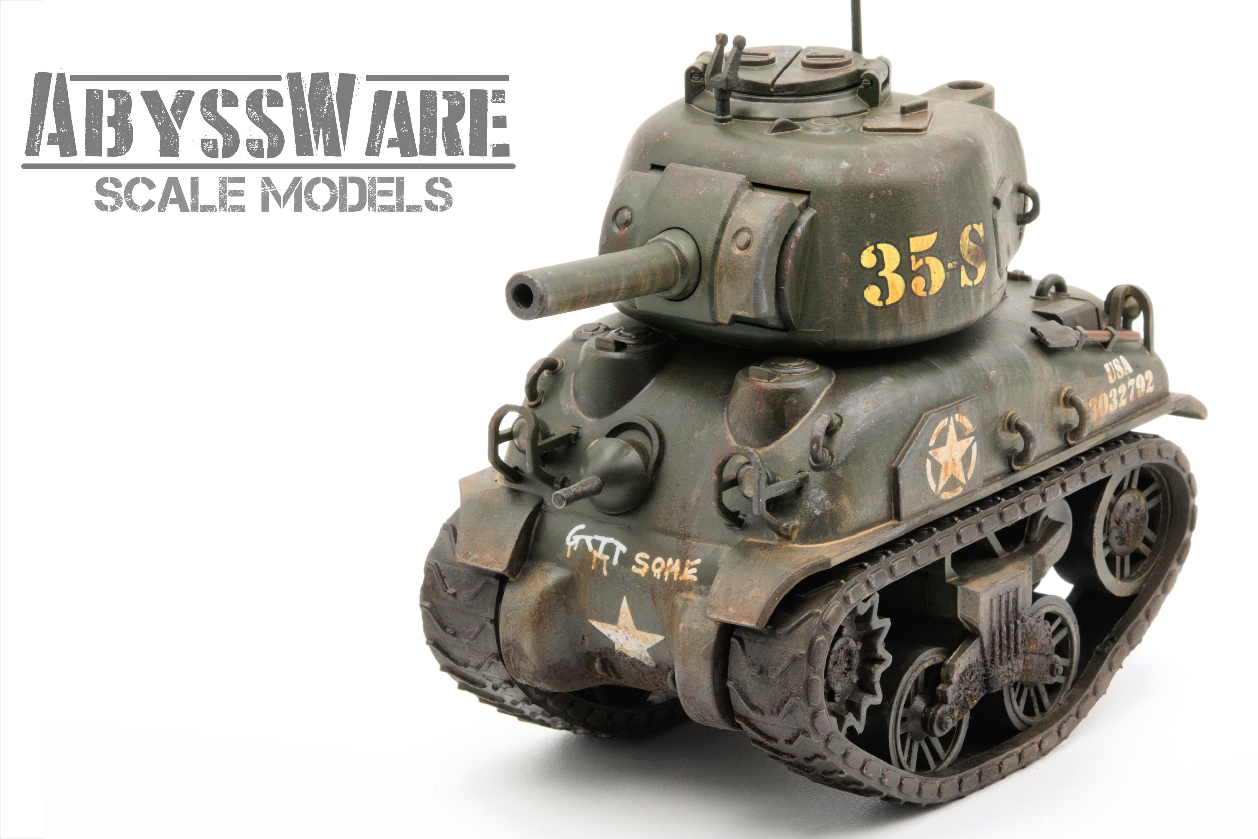 A scale model of a SHERMAN toon tank with a weathered, dark green finish and markings including a white star and the word "SOME" on the front. The tank has a turret with a long barrel, detailed wheels, and tracks.