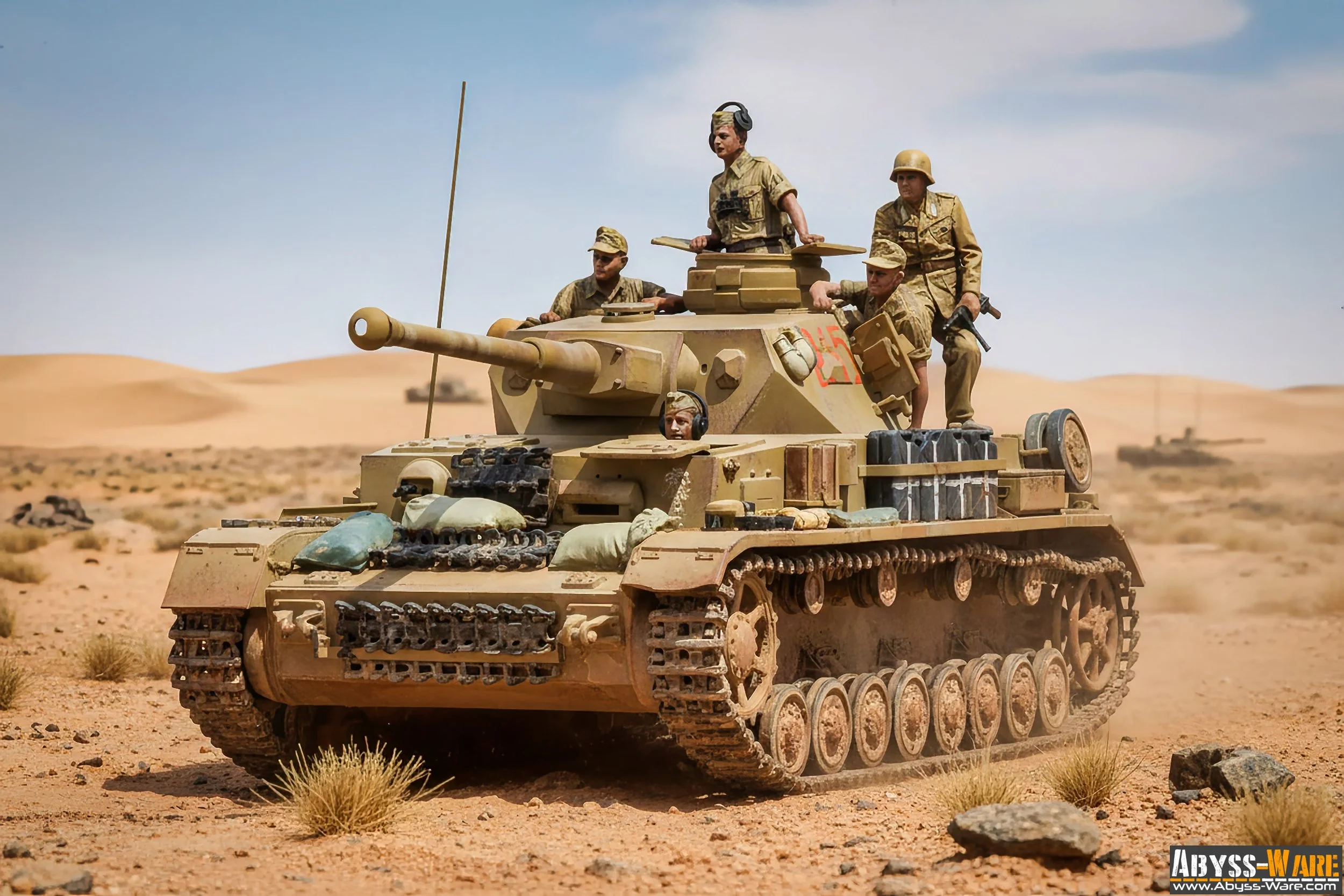 Model of an armored military tank with five soldiers in desert environment, with sand dunes and military vehicles in the background.