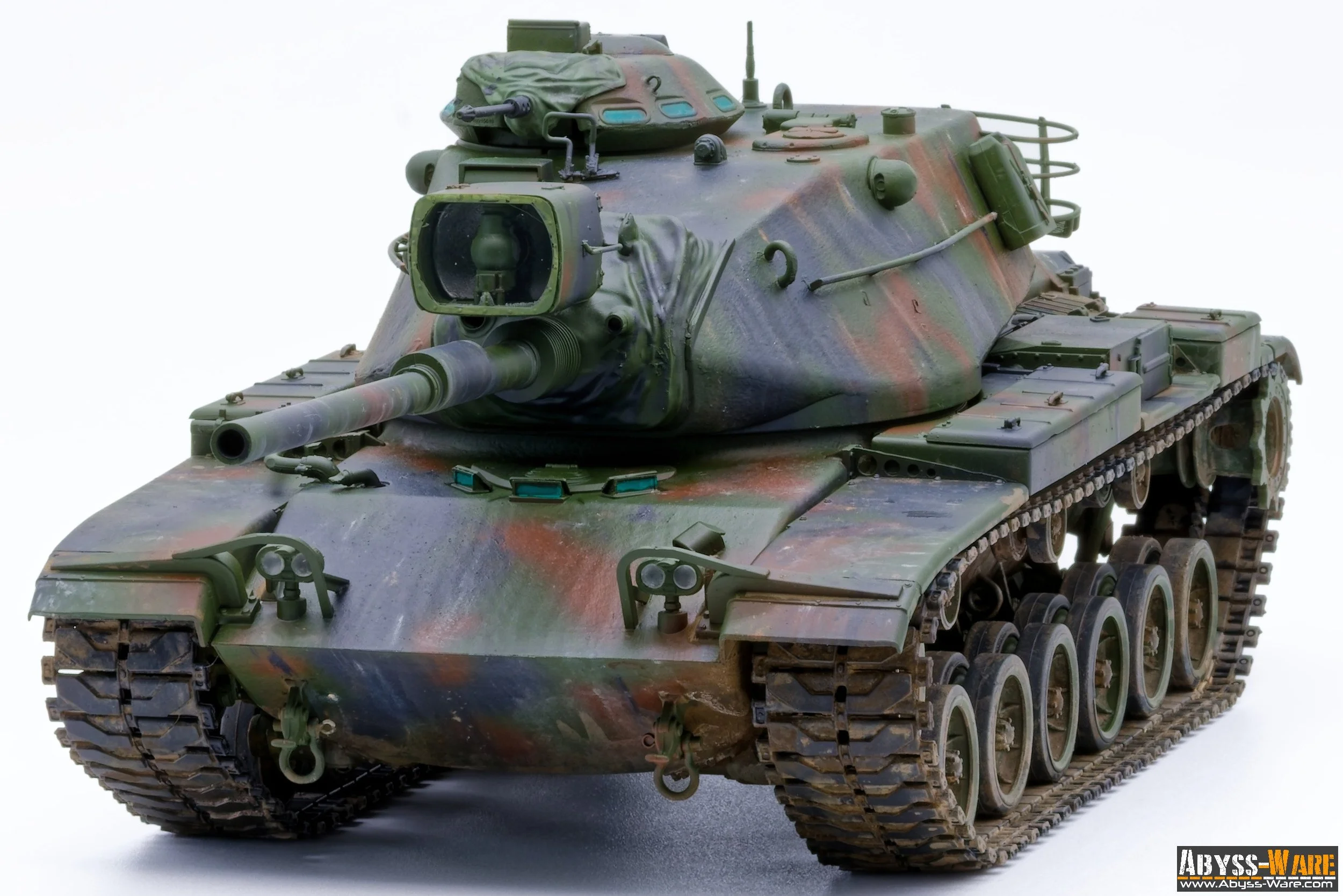 A military tank with a camouflaged green and brown pattern on a white background.
