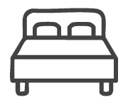 Simple line drawing of a bed with two pillows.