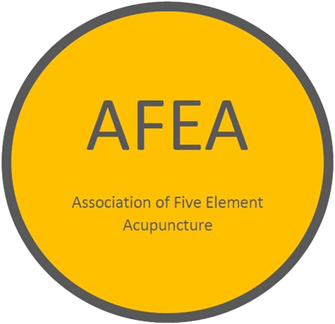 Yellow and black circular sign for the Association of Five Element Acupuncture (AFEA).