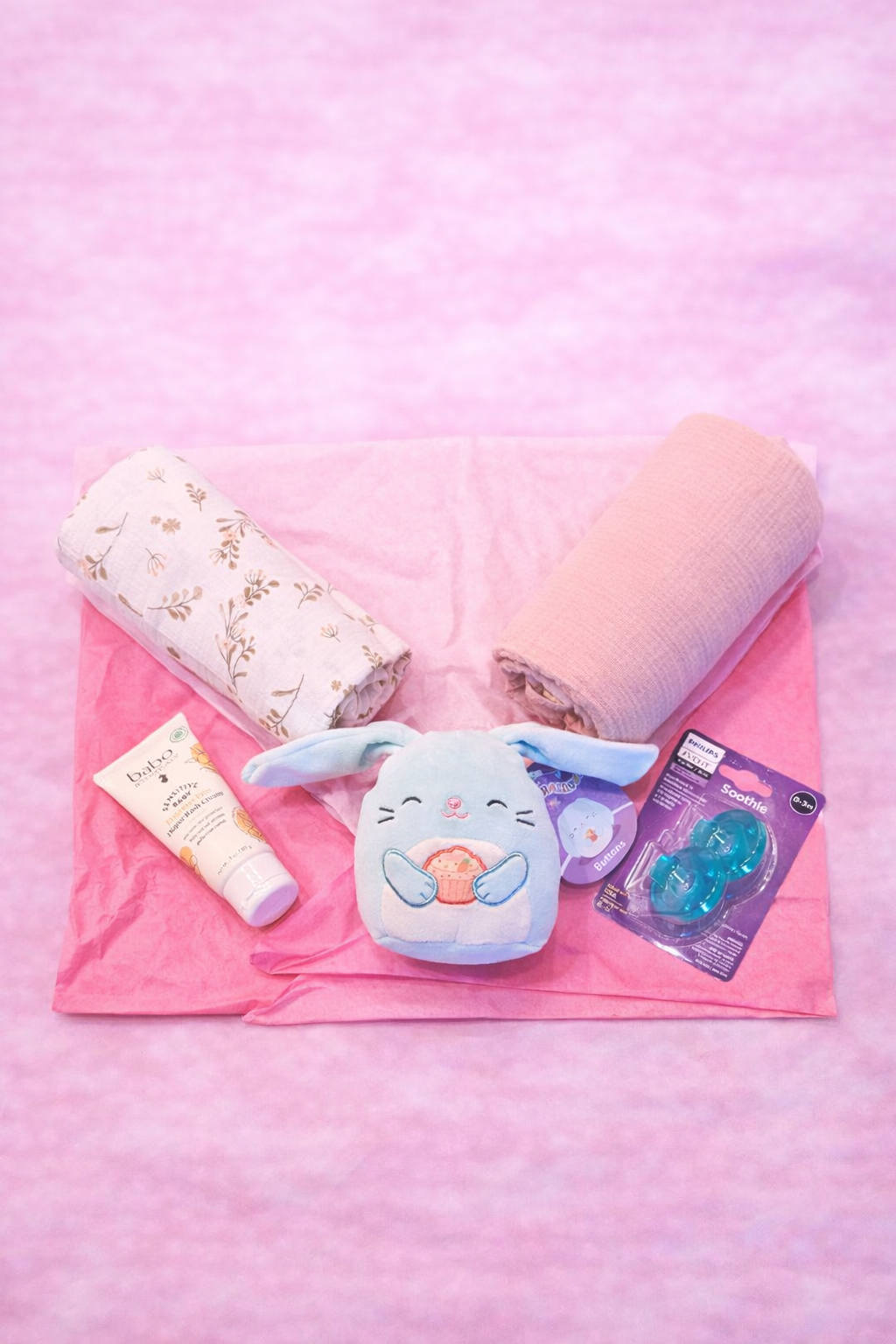 100% cotton baby swaddles, babo branded diaper rash cream for sensitive skin for newborn, plush bunny toy, and Philips Avent soothies for baby girl gifts in Houston, Texas.