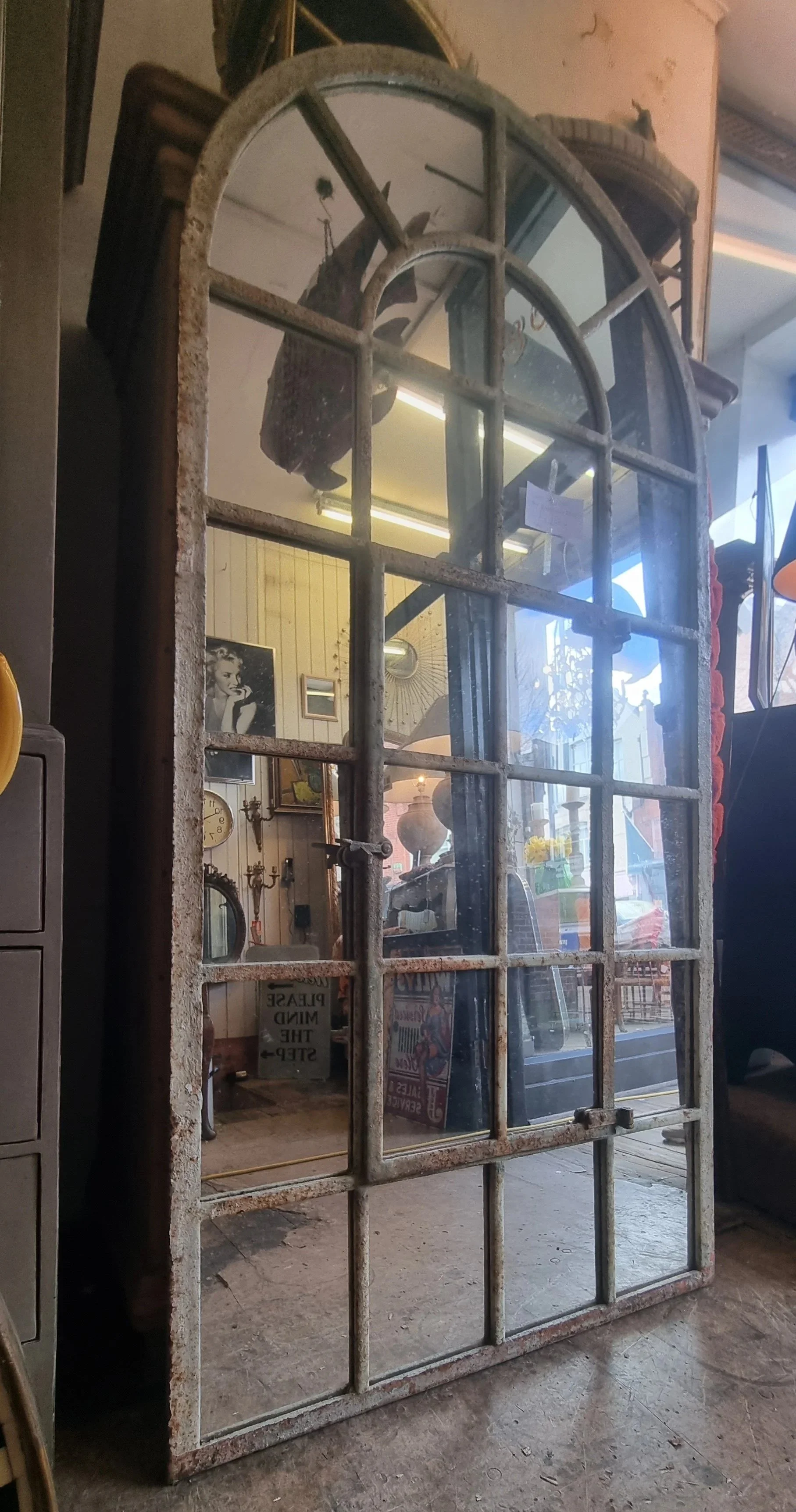 Cast iron mirror for gardens. Ann May furniture, Wandsworth Bridge Road