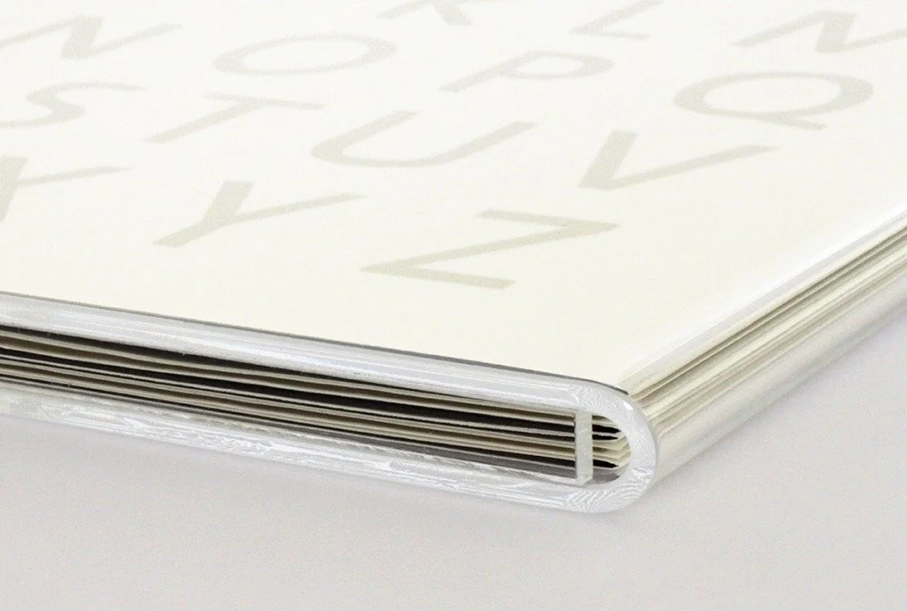  Detail of the two volumes “Alpha” and “Beta” in a plexiglass slipcase. 