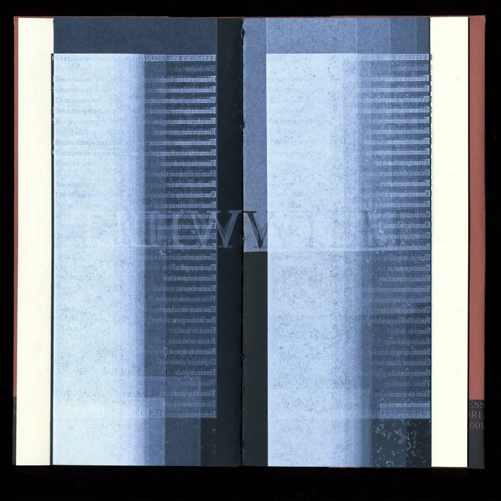  The “mid-point” of the book, where the covers of the double-signature pamphlet stitch wrap&nbsp;around to the interior of the book. The entirety of the book is printed in white ink on the black paper of the covers, making the entire structure appare