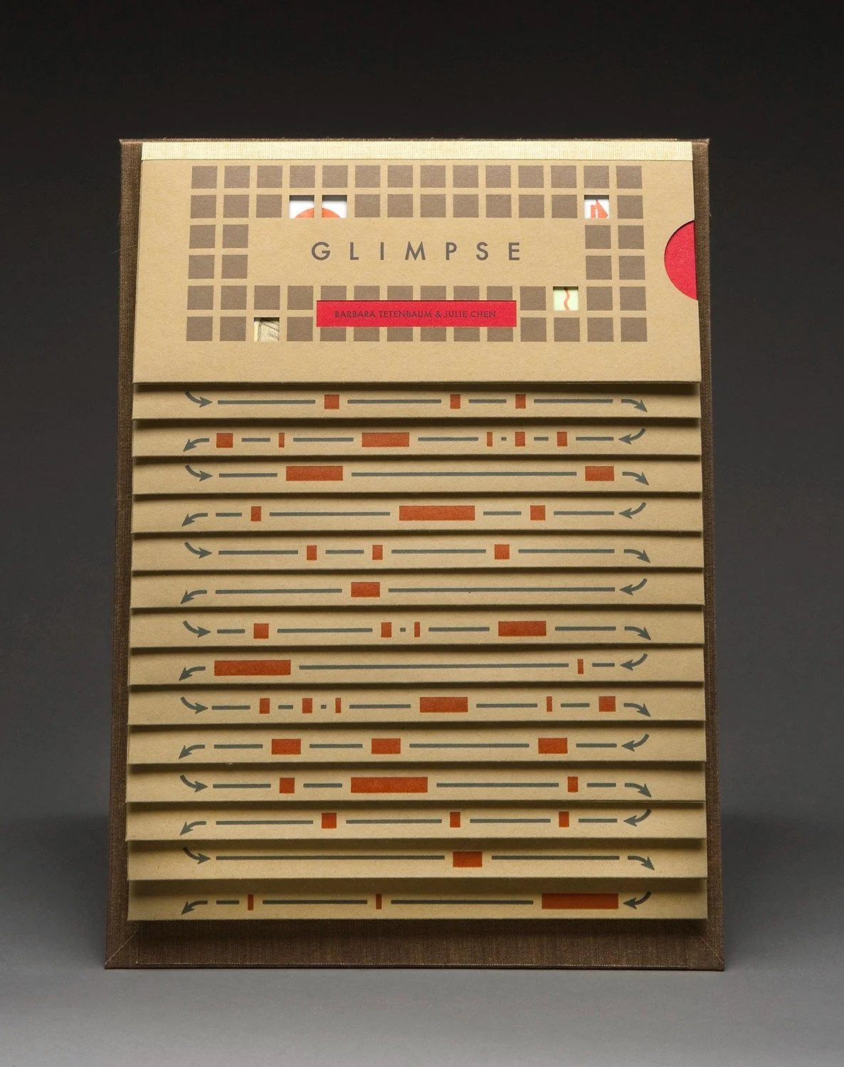  View of staggered pages showing envelopes/sleeves and diagram and numbers. These envelopes are flipped up to reveal text written by Julie Chen. 