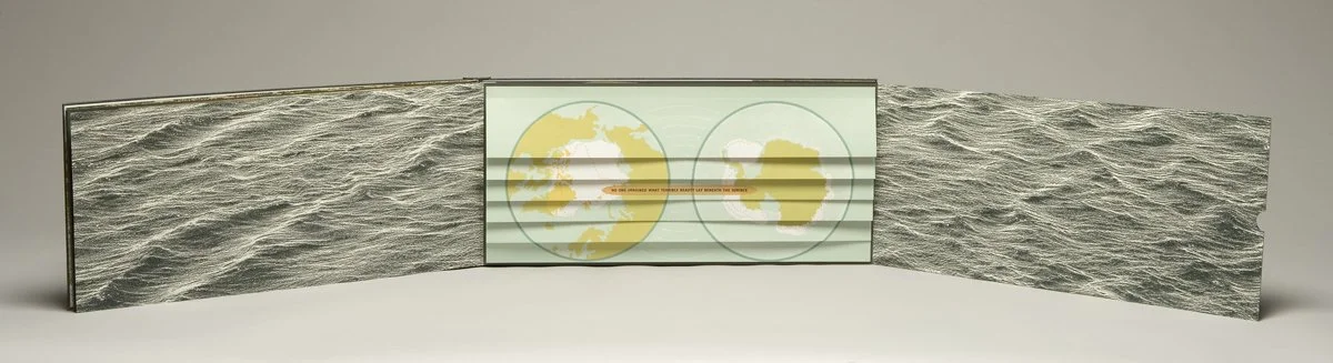  Tri-fold page spread with origami section closed. 