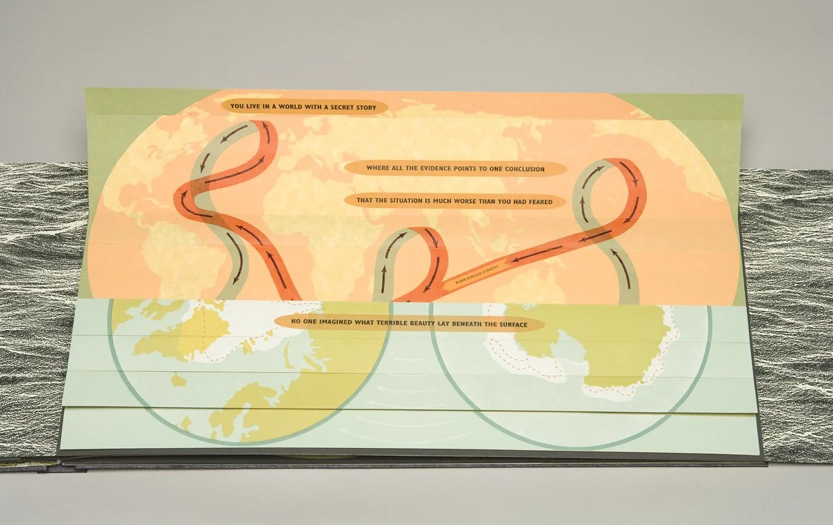  Tri-fold page spread close-up with origami section partially opened. 