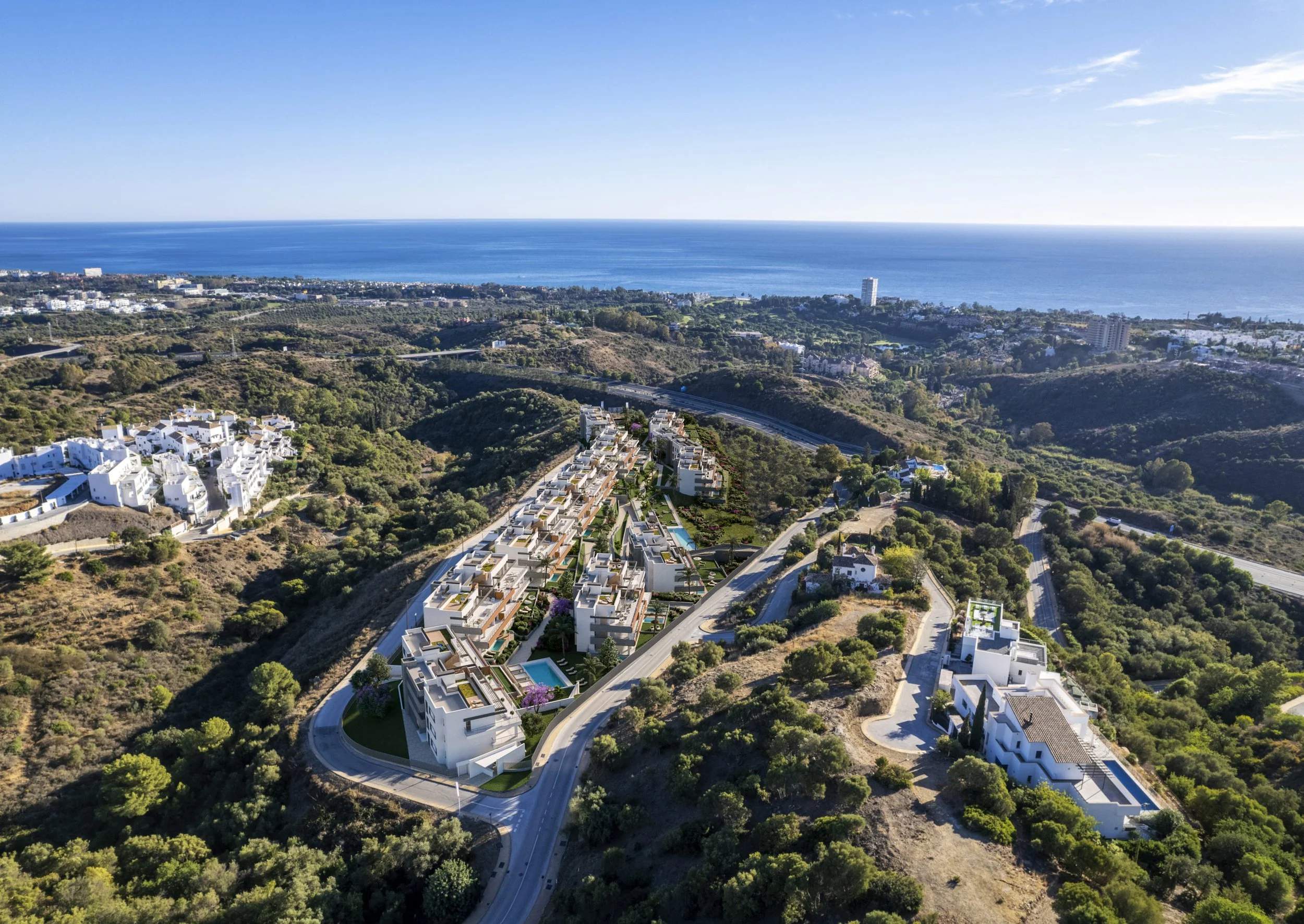 Aerial perspective of a hillside residential project overlooking the Mediterranean.