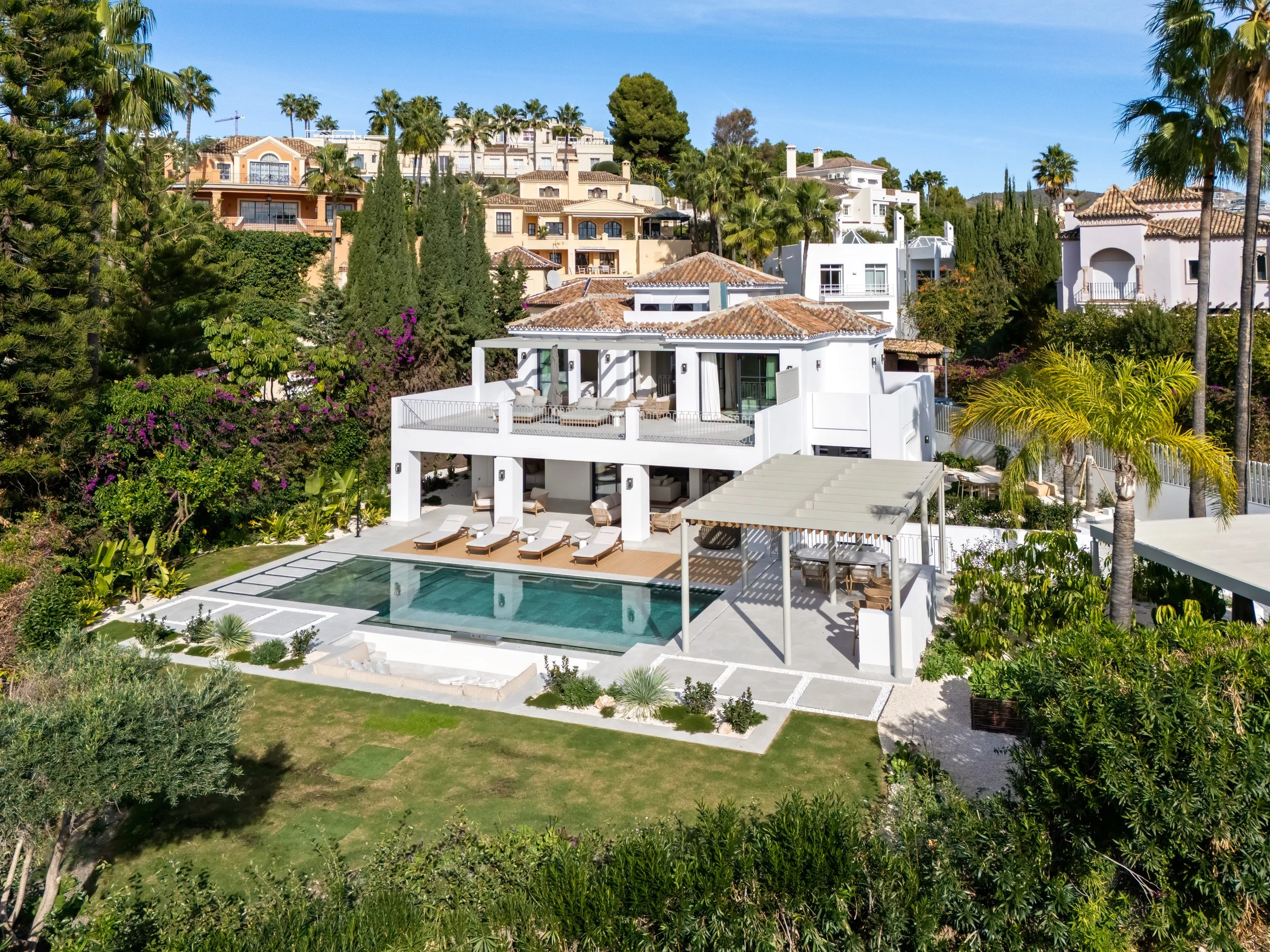An elevated view showing the property's privacy and its seamless integration into the lush La Quinta hillside.