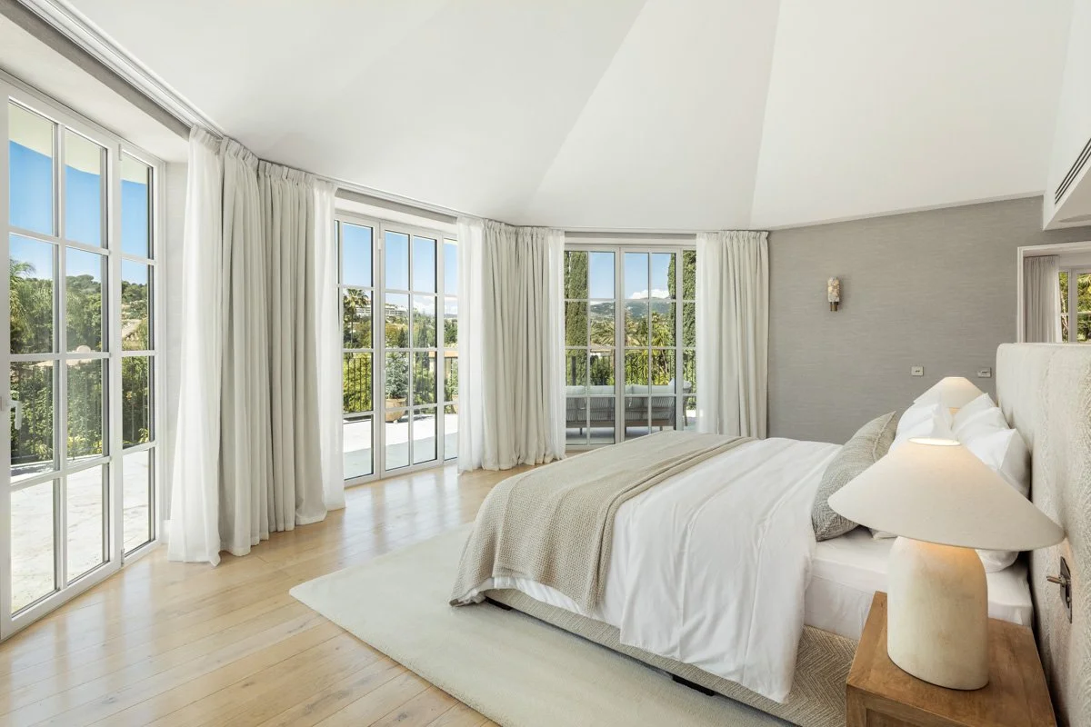 Spacious bedroom with floor-to-ceiling windows and direct terrace access in villa CMH614563S.