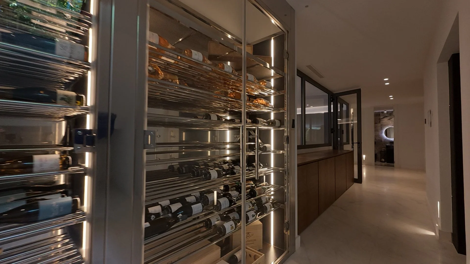 Detailed interior view of the bespoke temperature-controlled wine bodega/cella