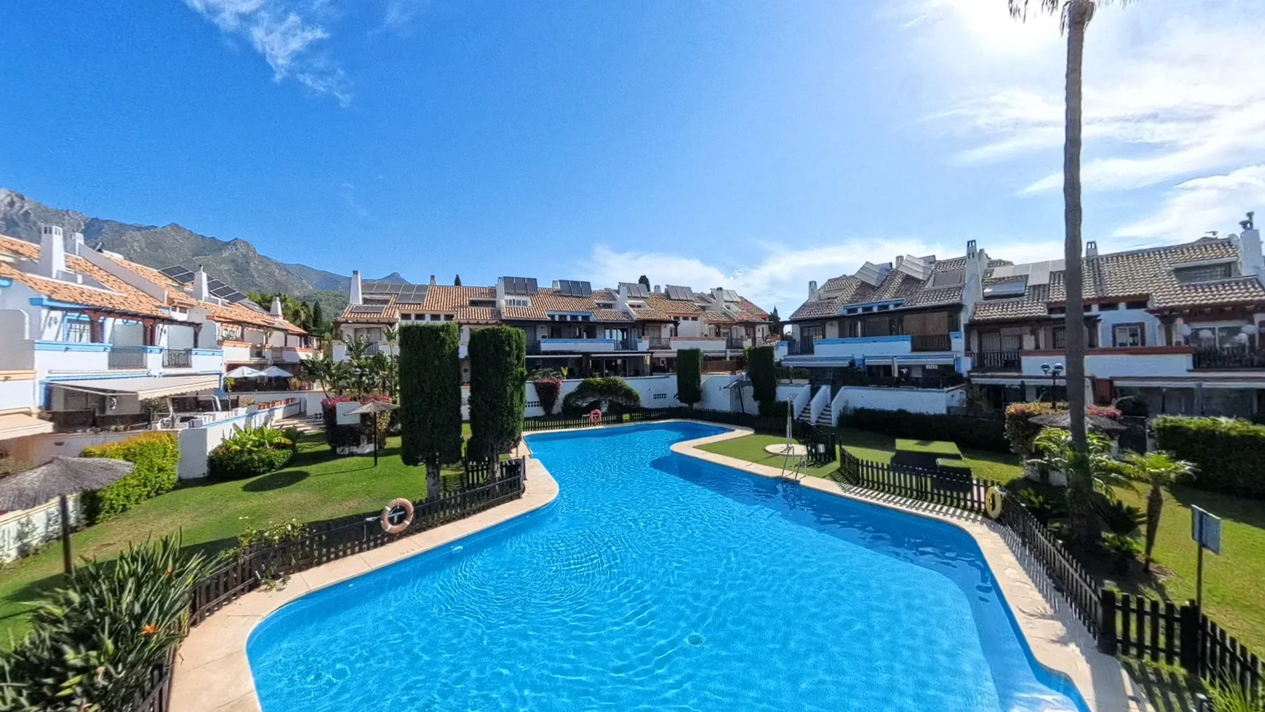 Luxury townhouse for sale Valdeolletas Marbella with communal pool and mountain views