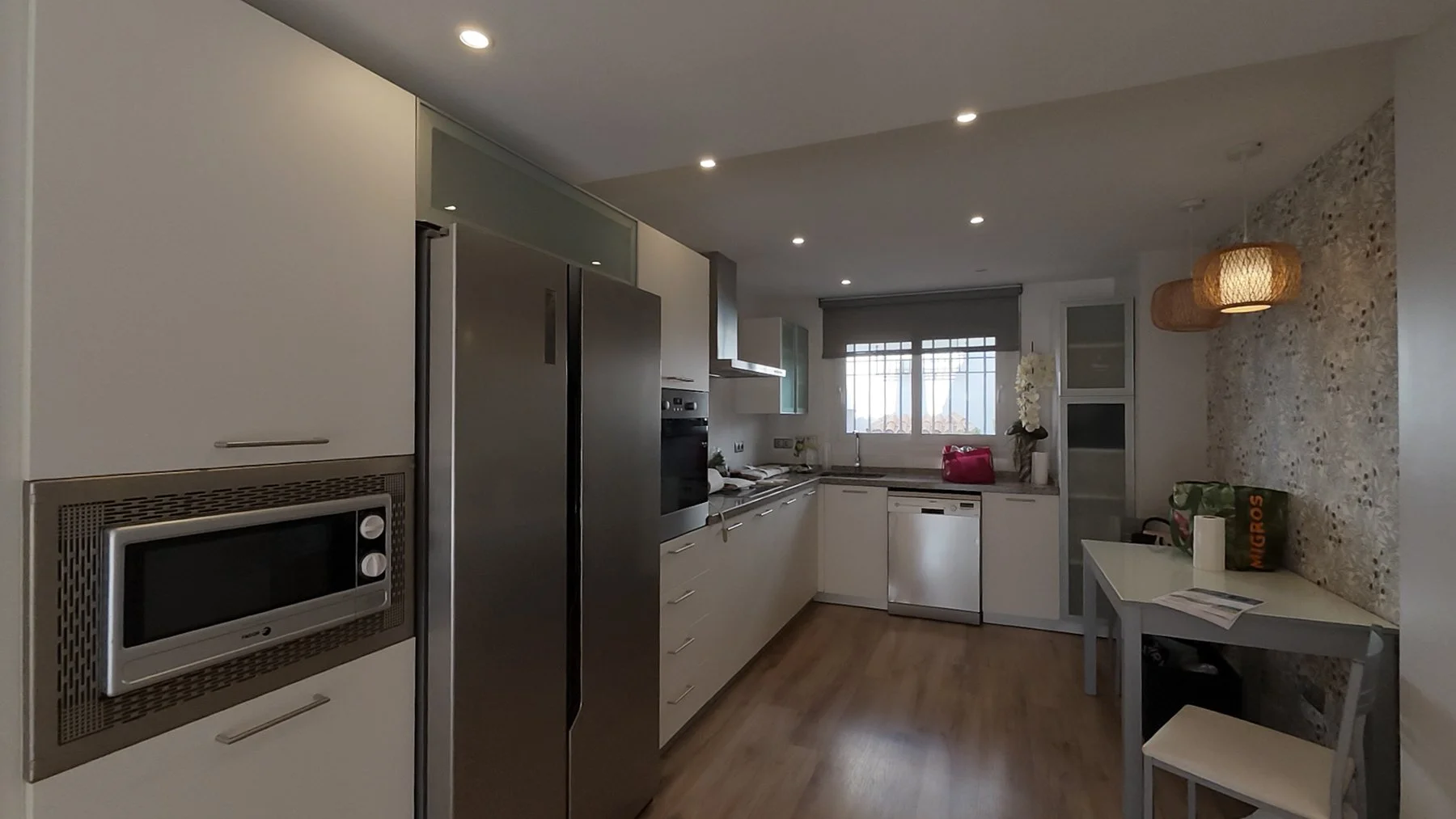 Showcase the modern, fully fitted kitchen and appliances.