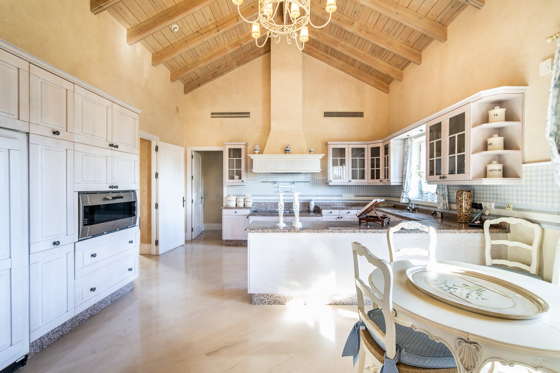 Functional, oversized kitchen area perfect for family living and entertaining.