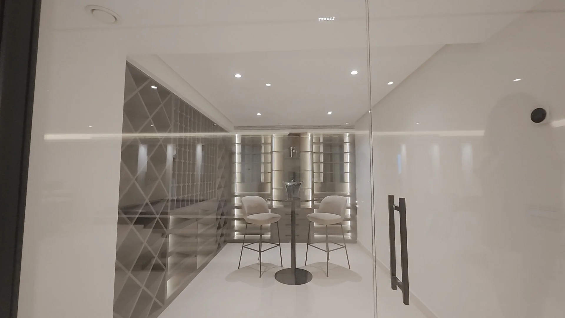 Custom climate-controlled wine cellar and tasting room..jpg