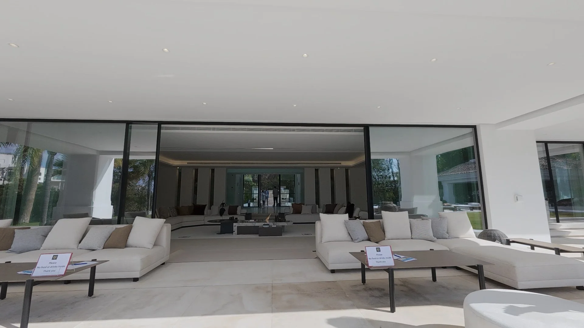 Terrace Lounge: A view of the outdoor relaxation zone, highlighting the deep shaded terraces and the infinity-edge pool.