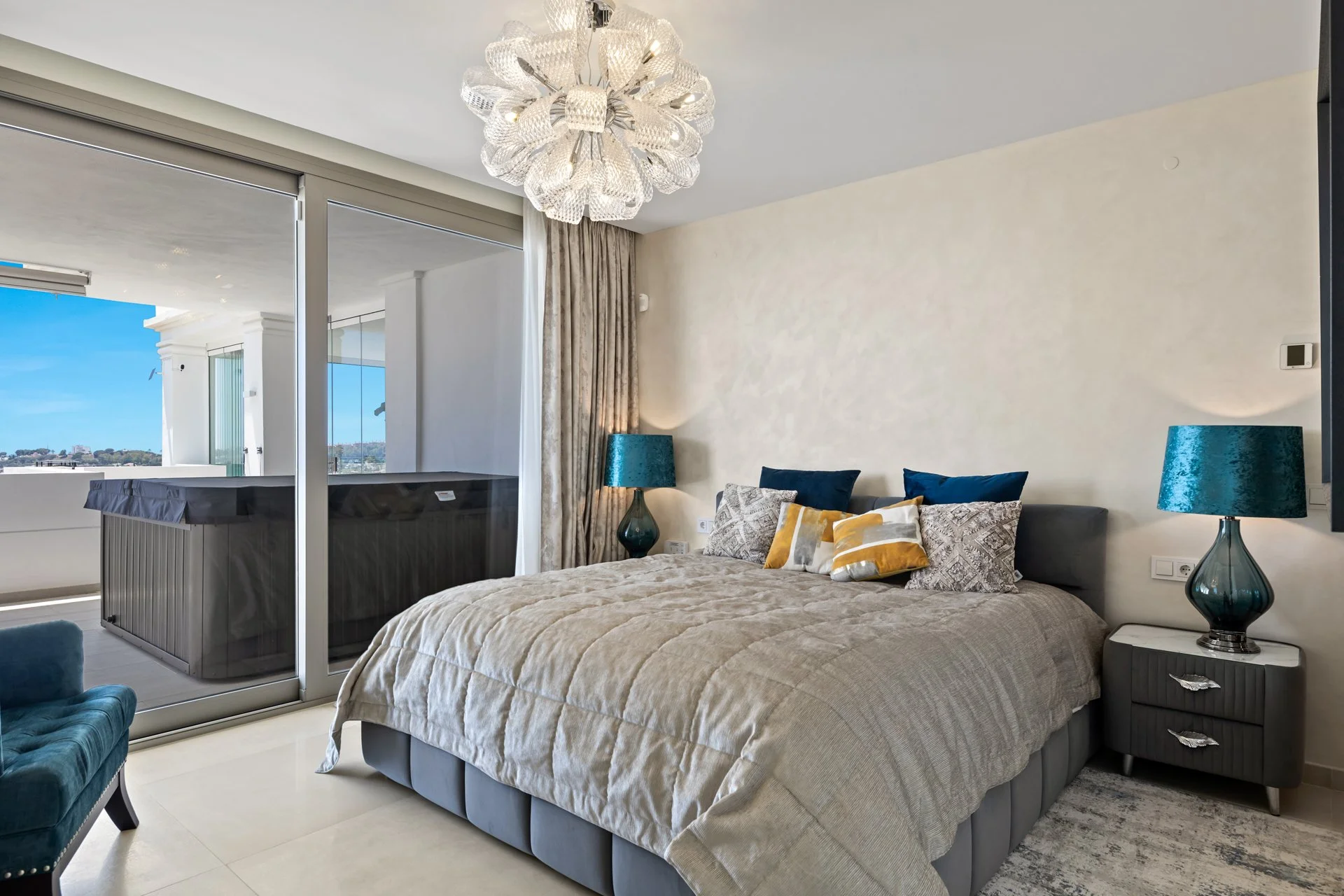 Master bedroom suite featuring private dressing area and terrace access.