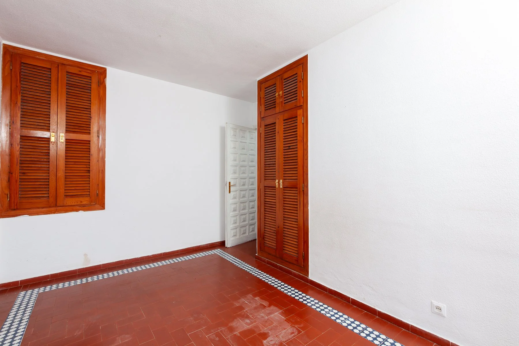 Generous primary bedroom with natural light, showcasing the footprint for a contemporary master suite.