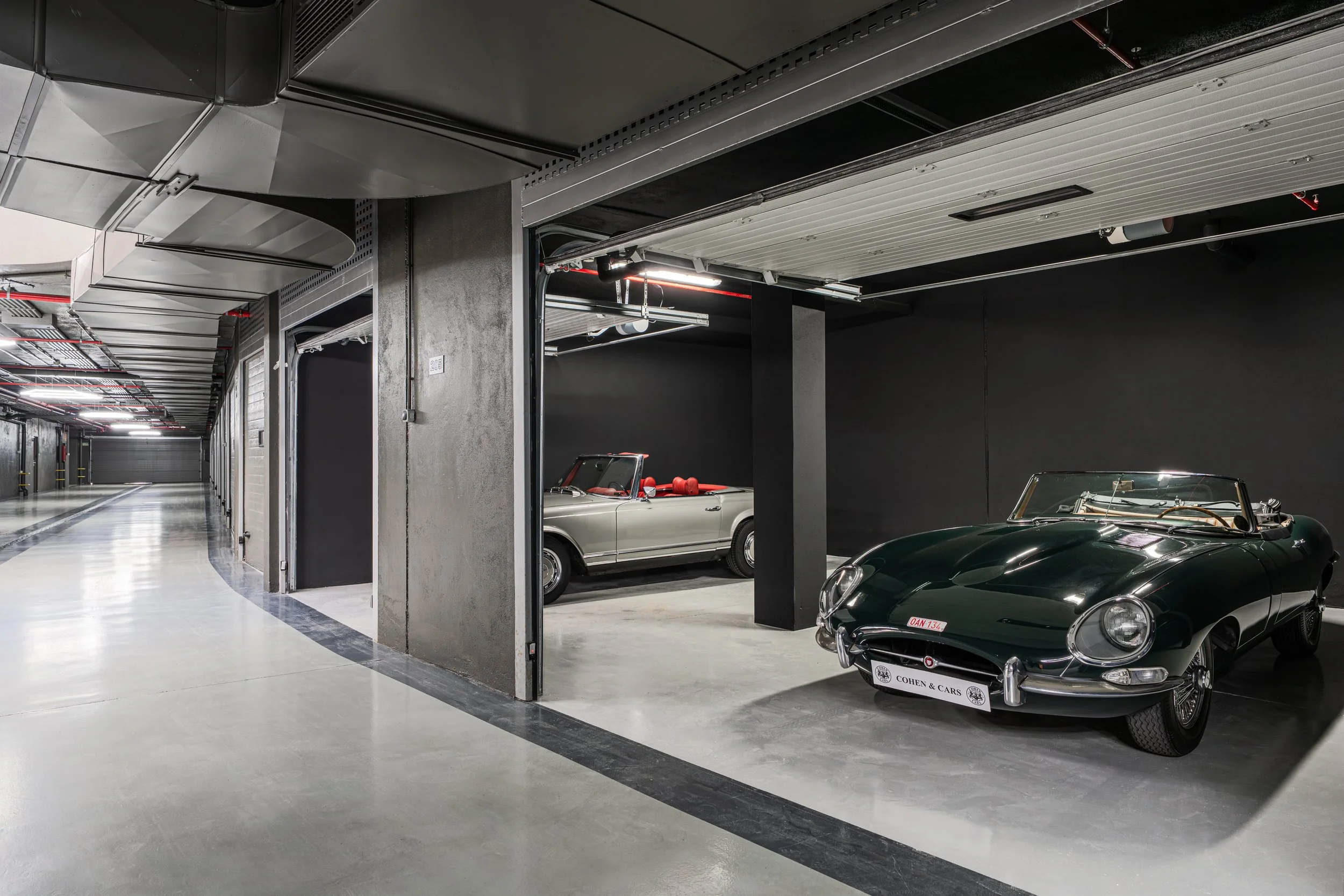 Private Garage: Secure underground parking for up to three cars at CMH2497S, with direct lift access to all residential levels.