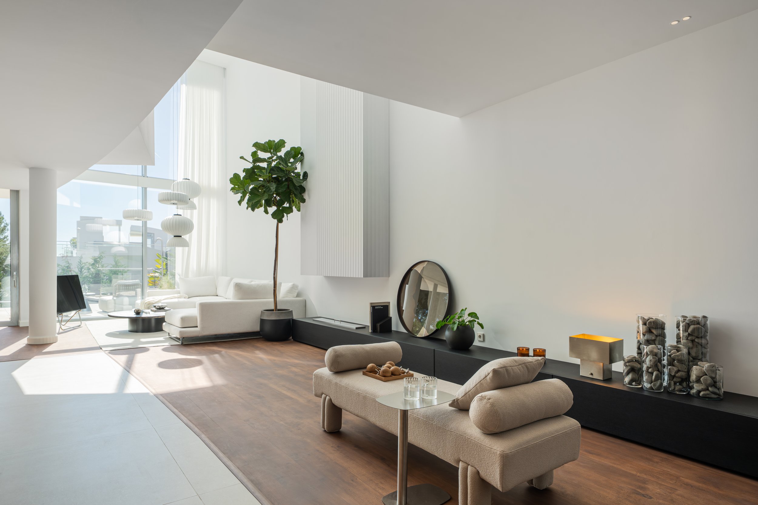 Seamless open-plan kitchen, dining, and living areas flowing to a private pool and terrace.