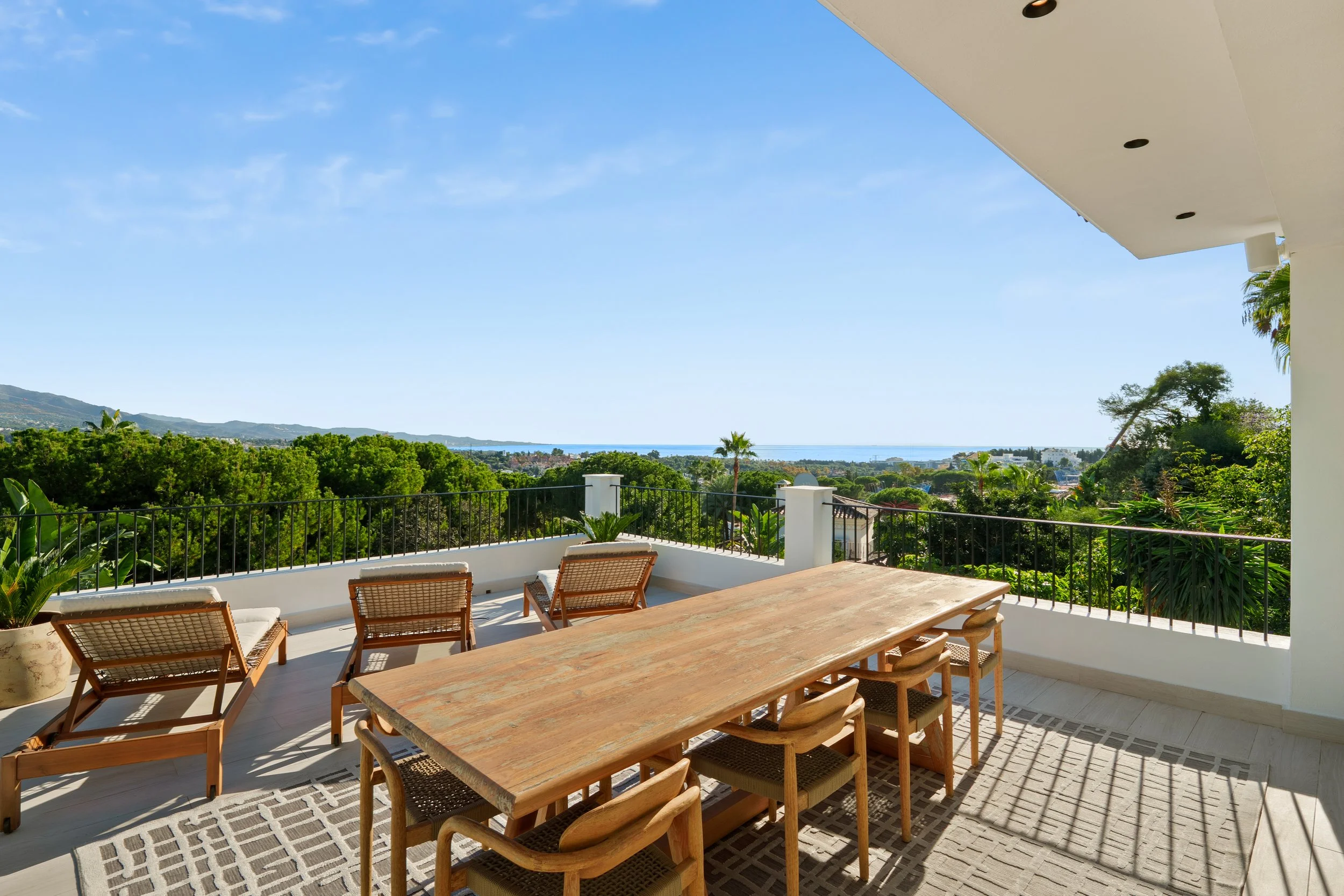 Panoramic Mediterranean view from the upper terrace overlooking the golf fairways.