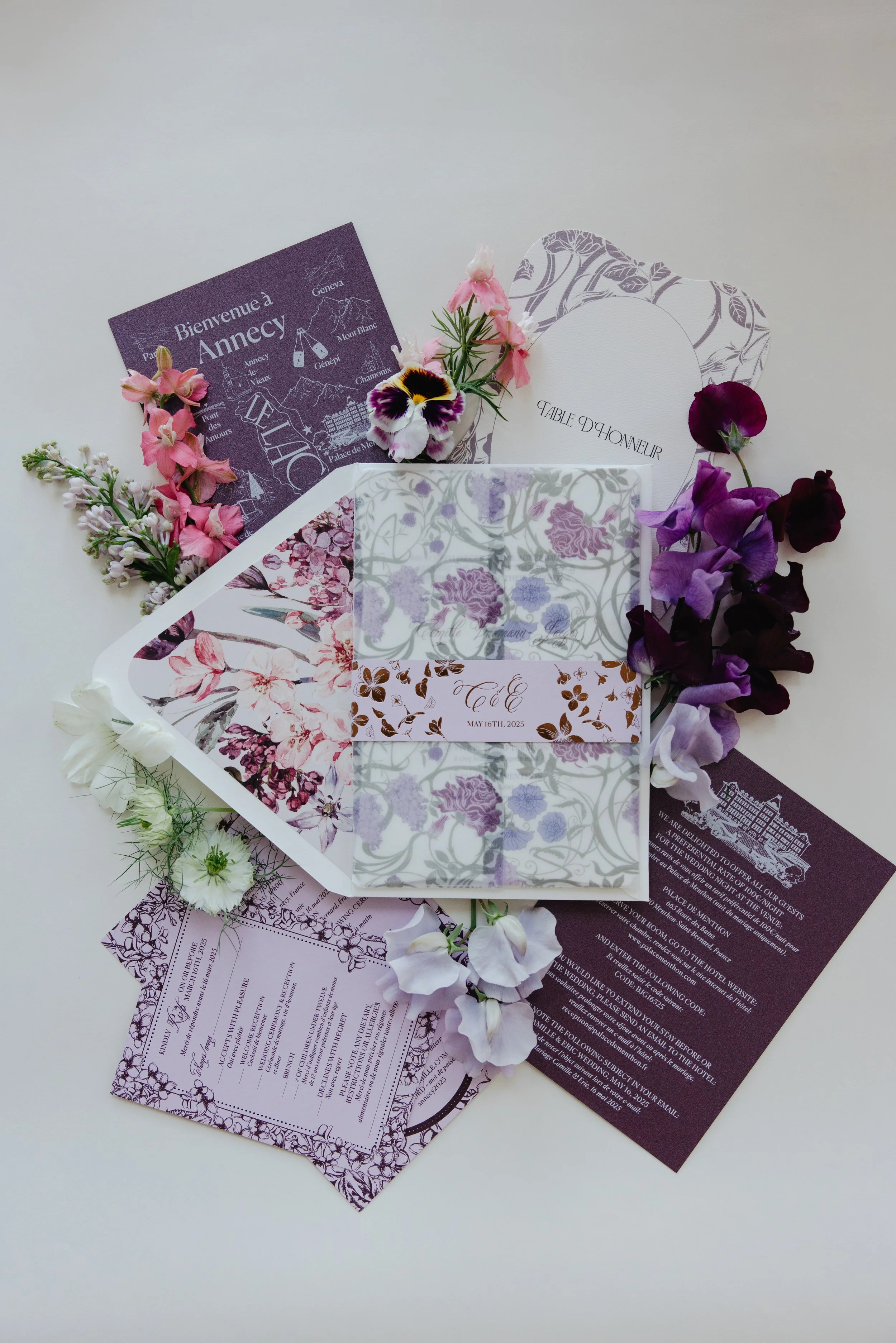 High-end stationery with invitation suite in purple lavender color for a wedding at the Palace de Menthon in Annecy