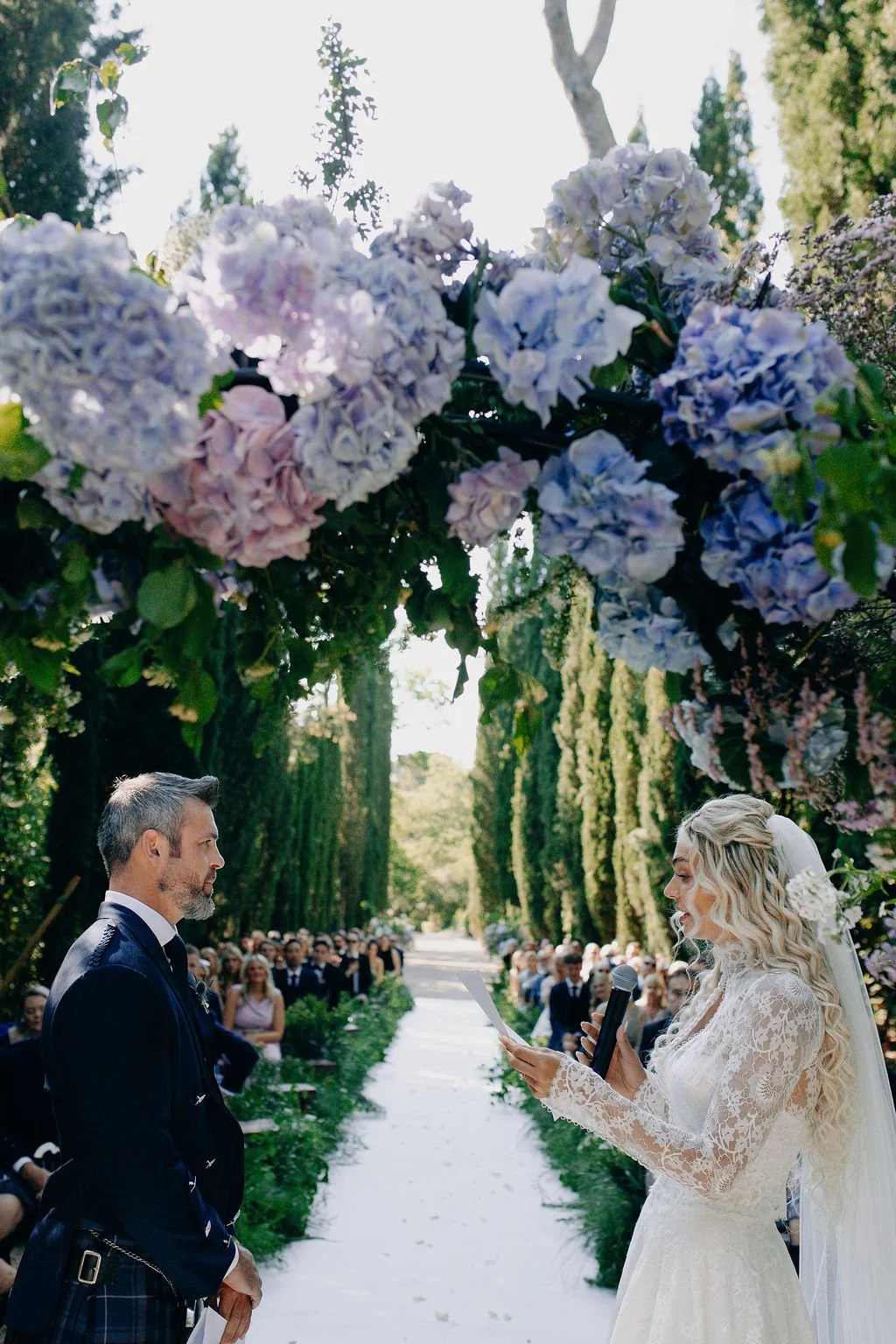 Breathtaking wedding ceremony in the cypress alley at Chateau Martinay Provence France