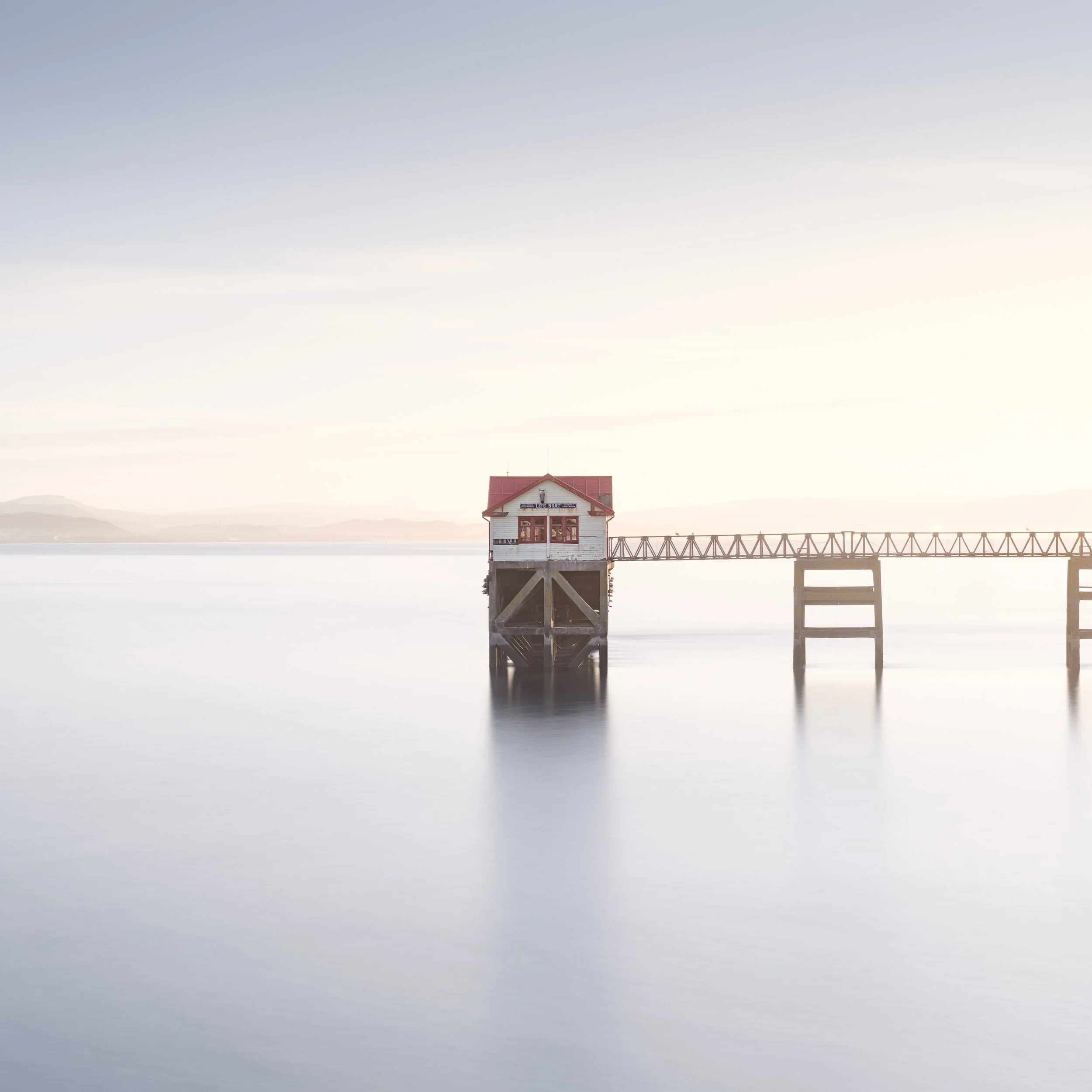 long exposure photograph mumbles life boat station