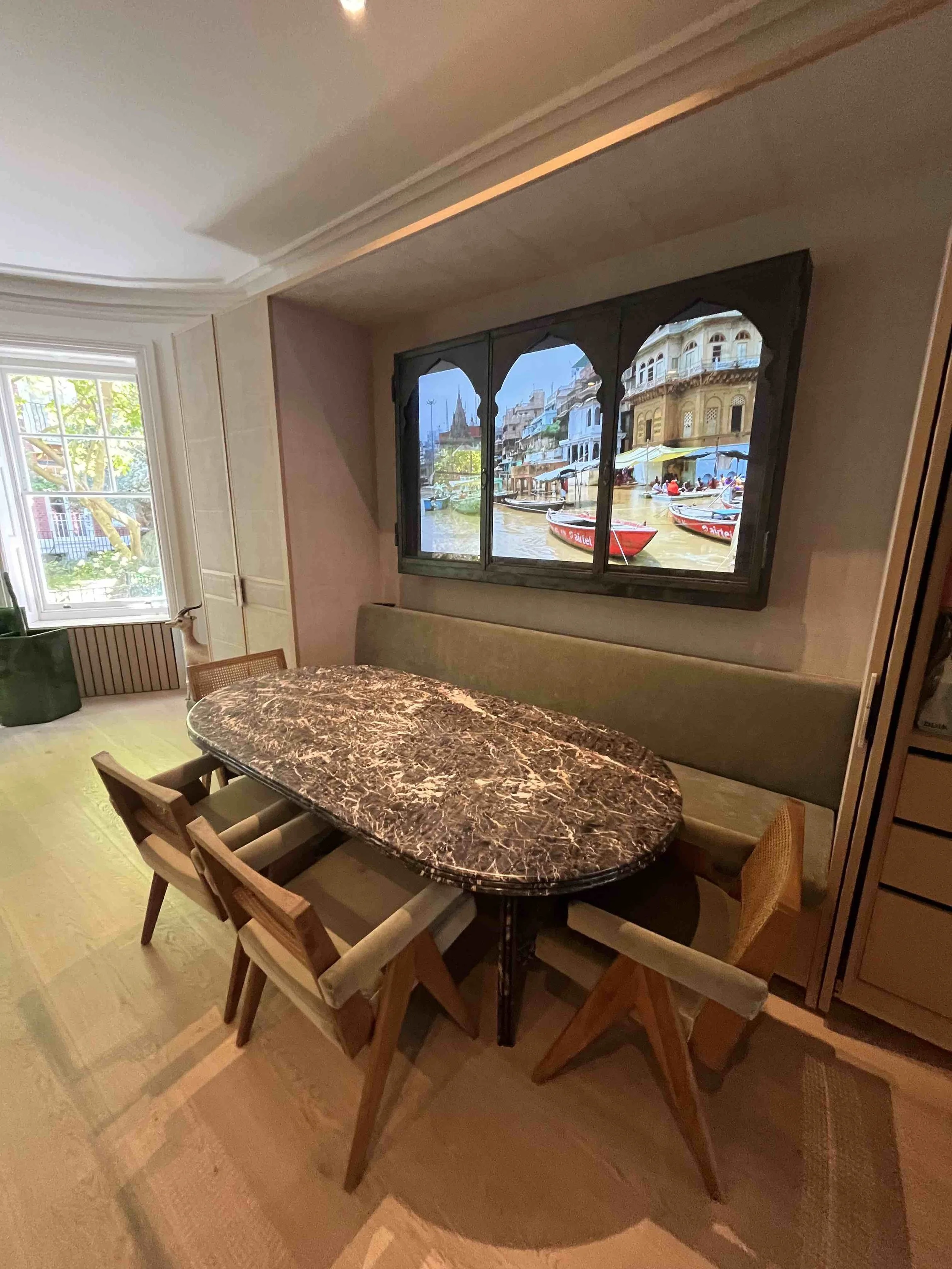 The use of a stunning marble and travertine through the house with solid oak floors elevates the simplicity of the design. 