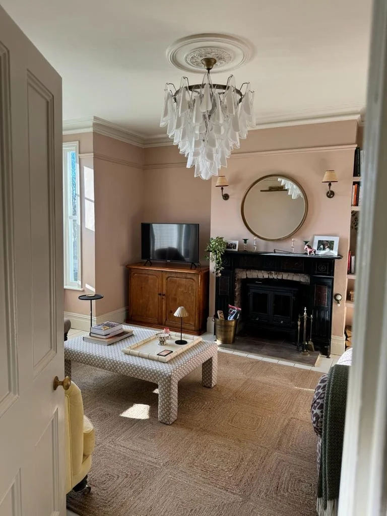 A client in Kent wanted a stylish sitting room. Painted in Edward Bulmer”s Jonquil, we added wide shelving to display stylish lamps, and other stylish accessories and also house the wood for the fire. Other larger accessories were sourced for the roo
