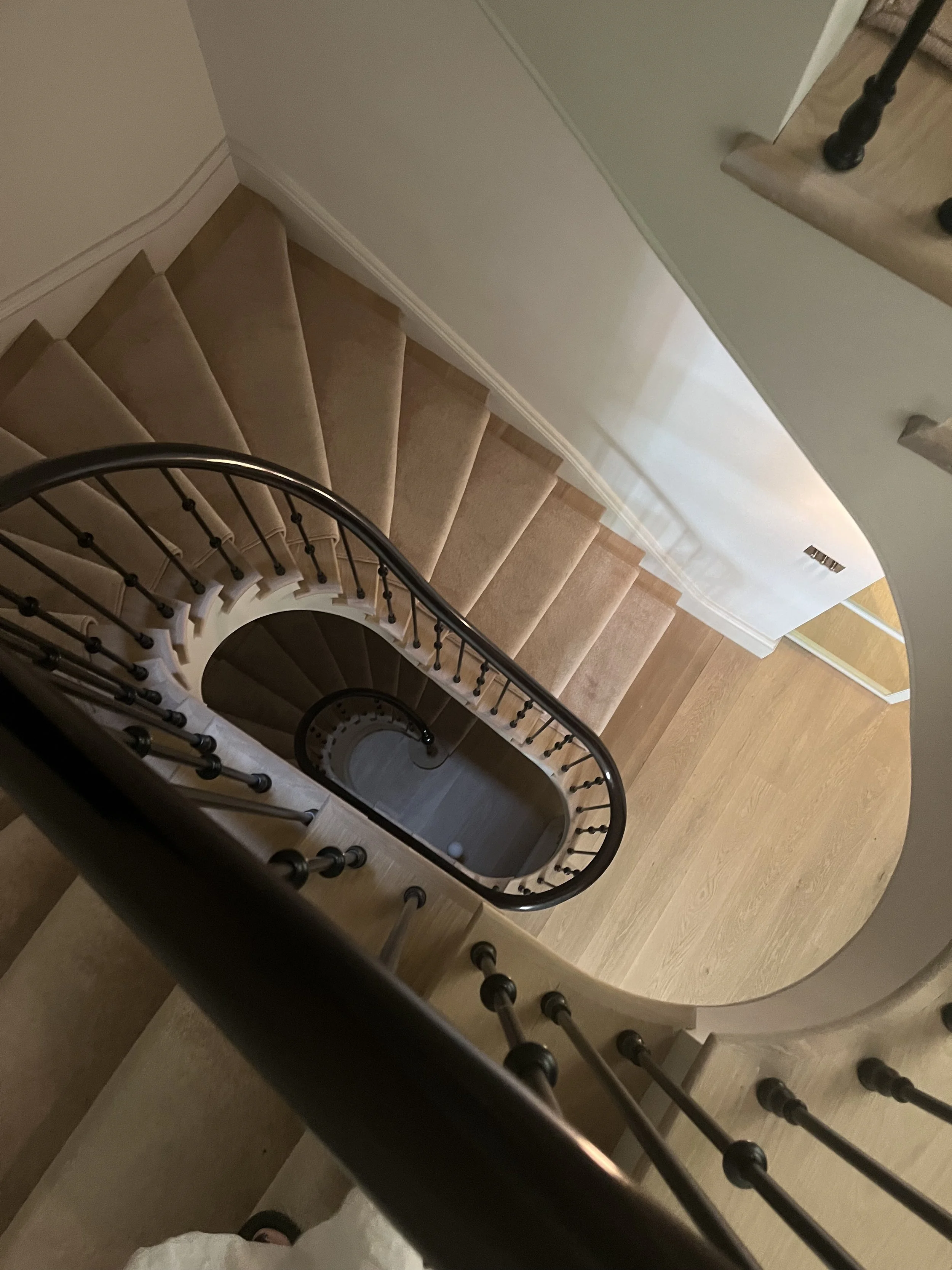 A stunning new spiral staircase was built which created the perfect smooth flow between floors 