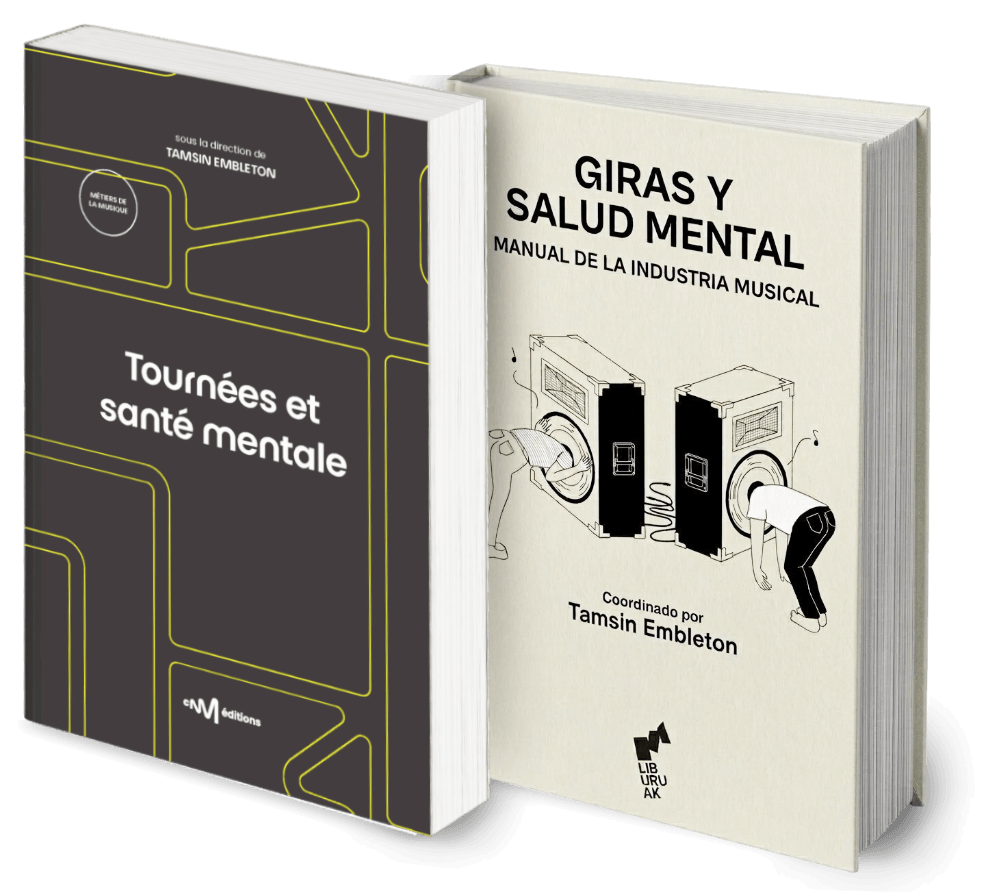 Two books standing upright, one titled in Spanish 'Girás y Salud Mental, Manual de la Industria Musical', and the other in French 'Tournées et santé mentale'.