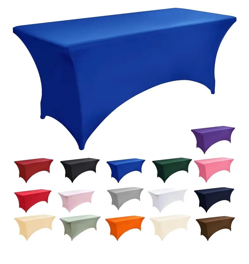 A collection of tablecloths in various colors displayed on tables, including blue, black, purple, red, pink, green, gray, white, navy, beige, light green, orange, cream, and brown.