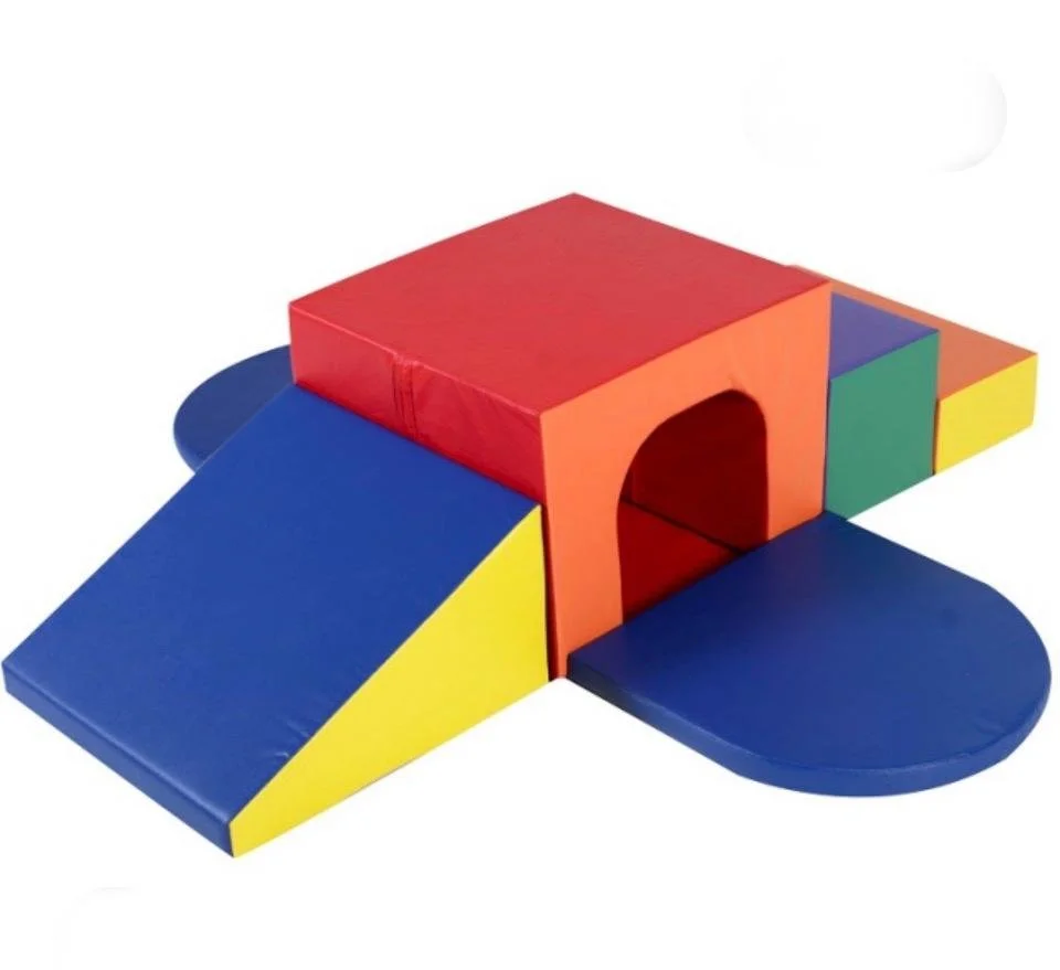 Colorful padded foam climbing structure for children, featuring blue, red, yellow, green, and purple sections with archways and ramps.