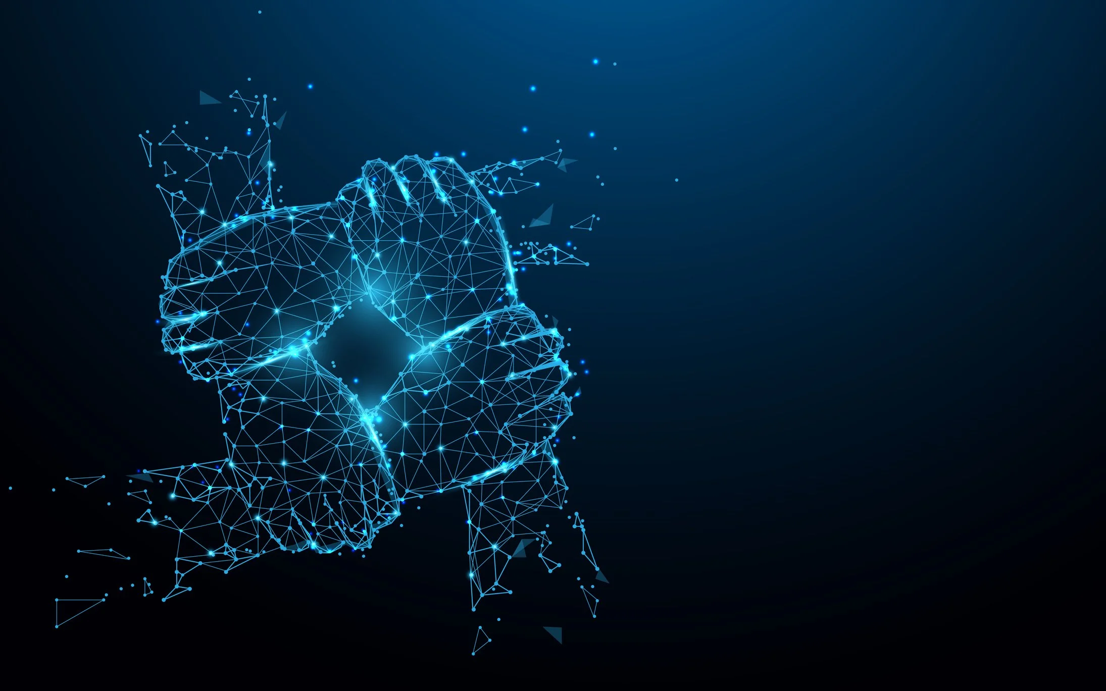 Digitales Abbild zweier Hände, die sich in einem Handschlag treffen, bestehend aus blauen Linien und Lichtpunkten, symbolisiert Zusammenarbeit und Technologie.