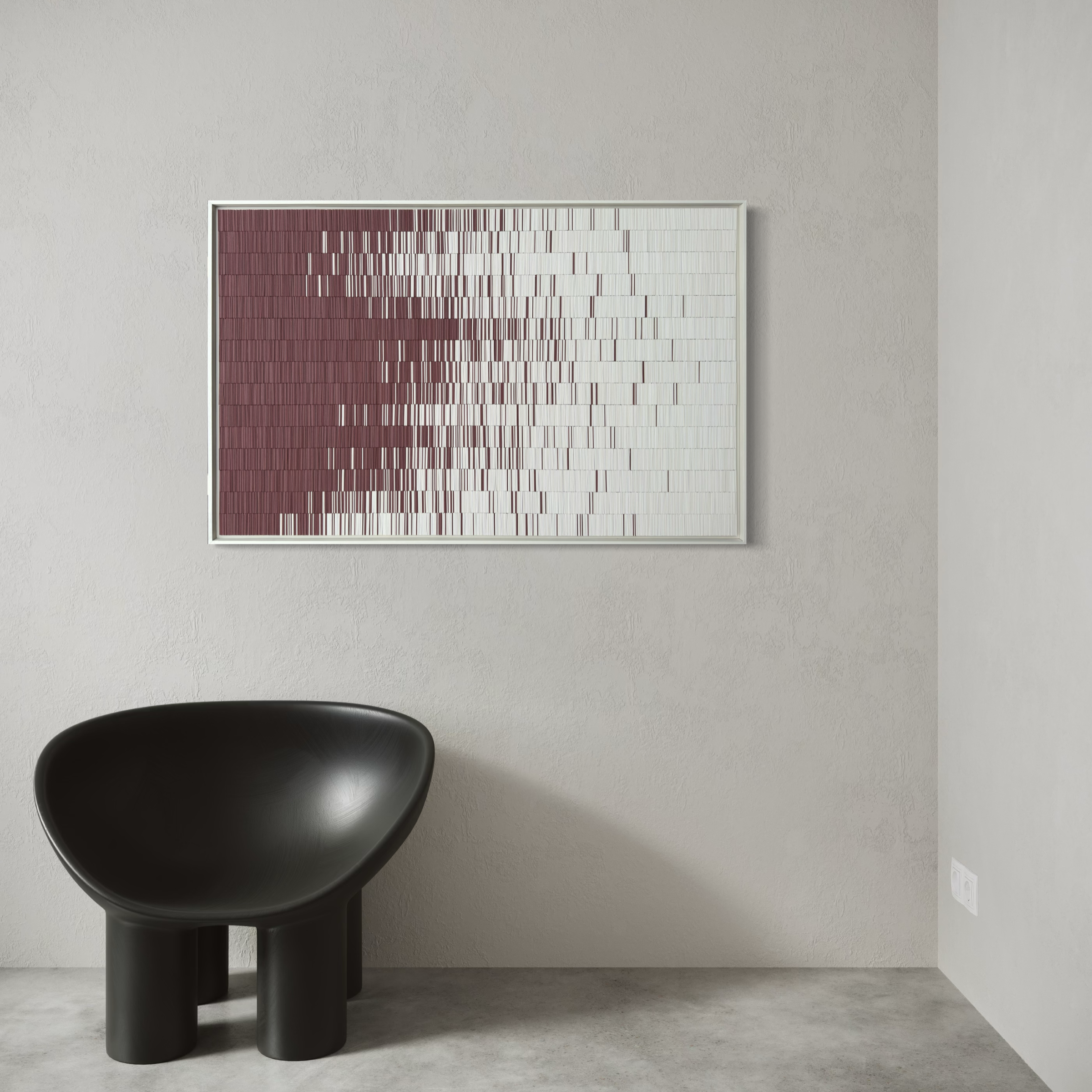 A minimalist interior with a white textured wall, a framed abstract art piece with grid patterns in shades of maroon and white, a black modern chair with cylindrical legs, and a standard electrical outlet visible on the wall.