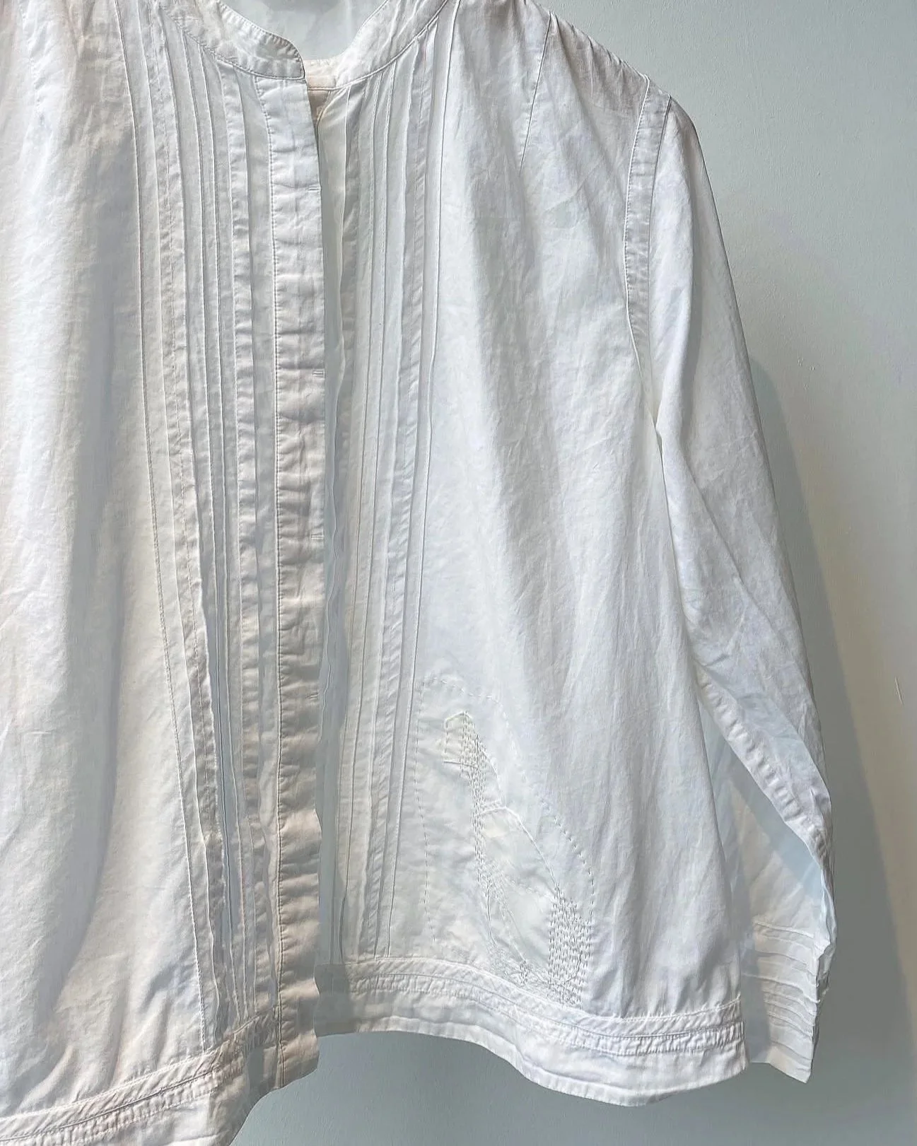 Invisible patch repairs and sashiko in matching fabric and thread